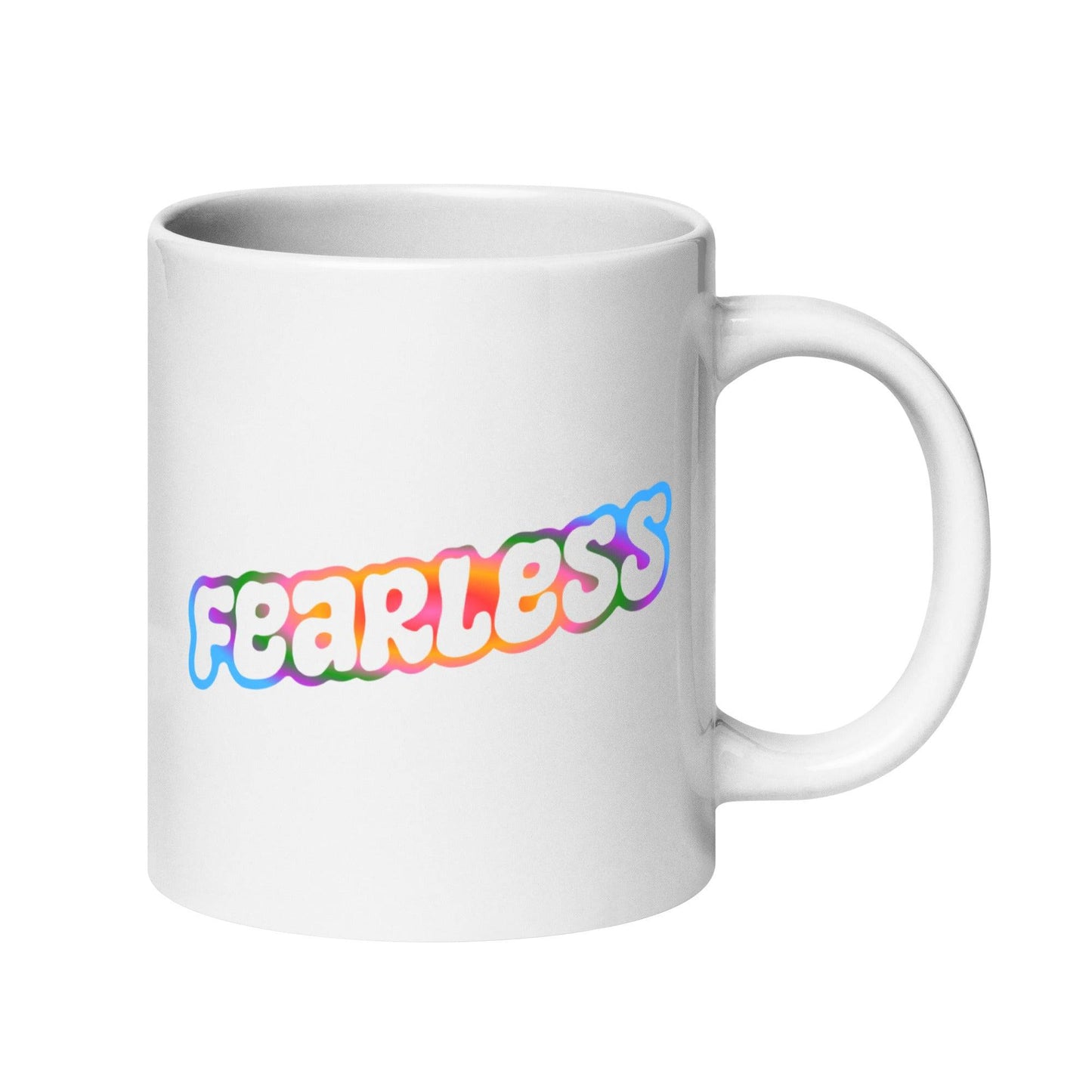 Introducing the Fearless Mug by Pridelity: a striking white mug featuring the word "fearless" in bubble-style letters, accented with a vibrant gradient of pink, orange, yellow, and blue. Part of the standout best pride collections for 2025, this mug offers a simple yet impactful design.