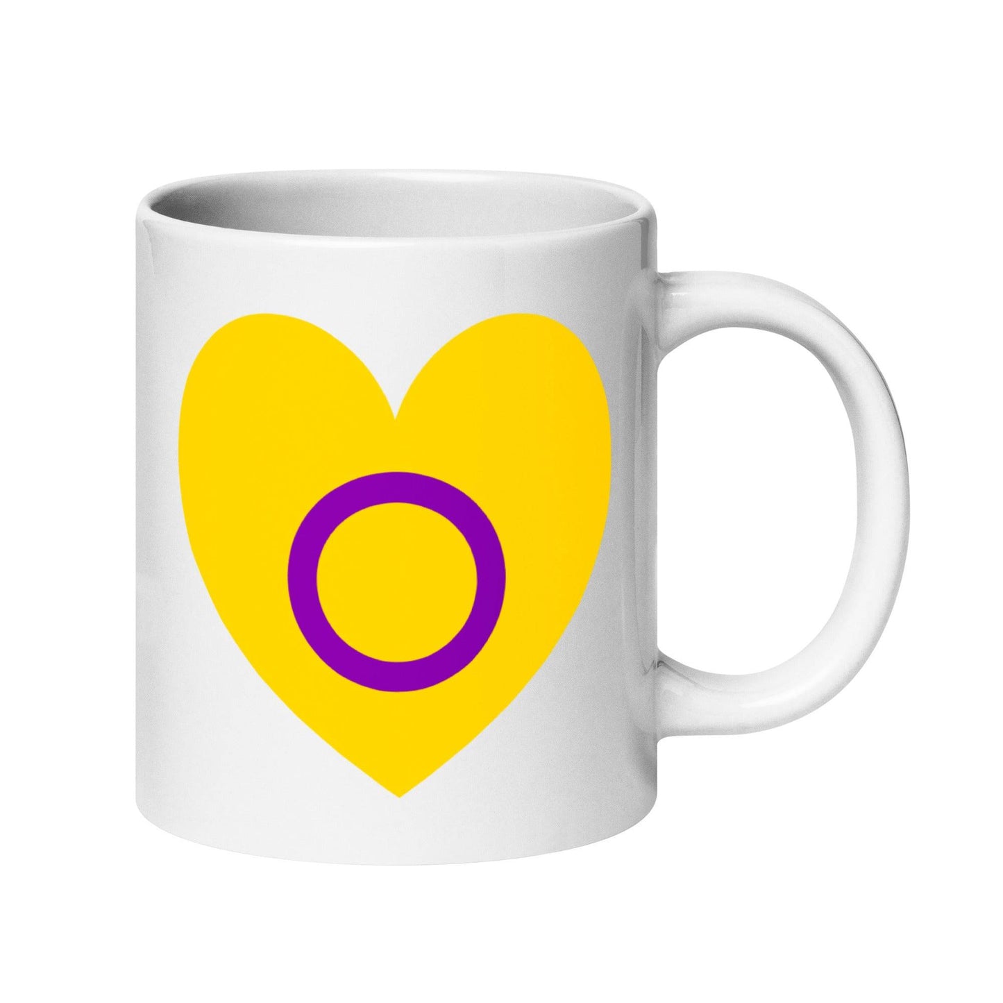 Introducing the Intersex Heart Mug from Pridelity's renowned 2025 pride collection. This white mug features a vibrant yellow heart with a purple circle at its center, and its elegantly placed handle on the right side adds to its charm.