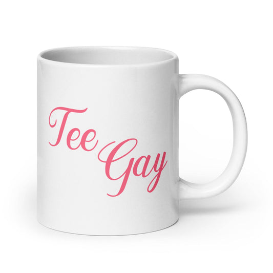 High-quality white mug featuring 'Tee Gay' in pink cursive font, a fun and bold addition to any pride-themed drinkware collection.