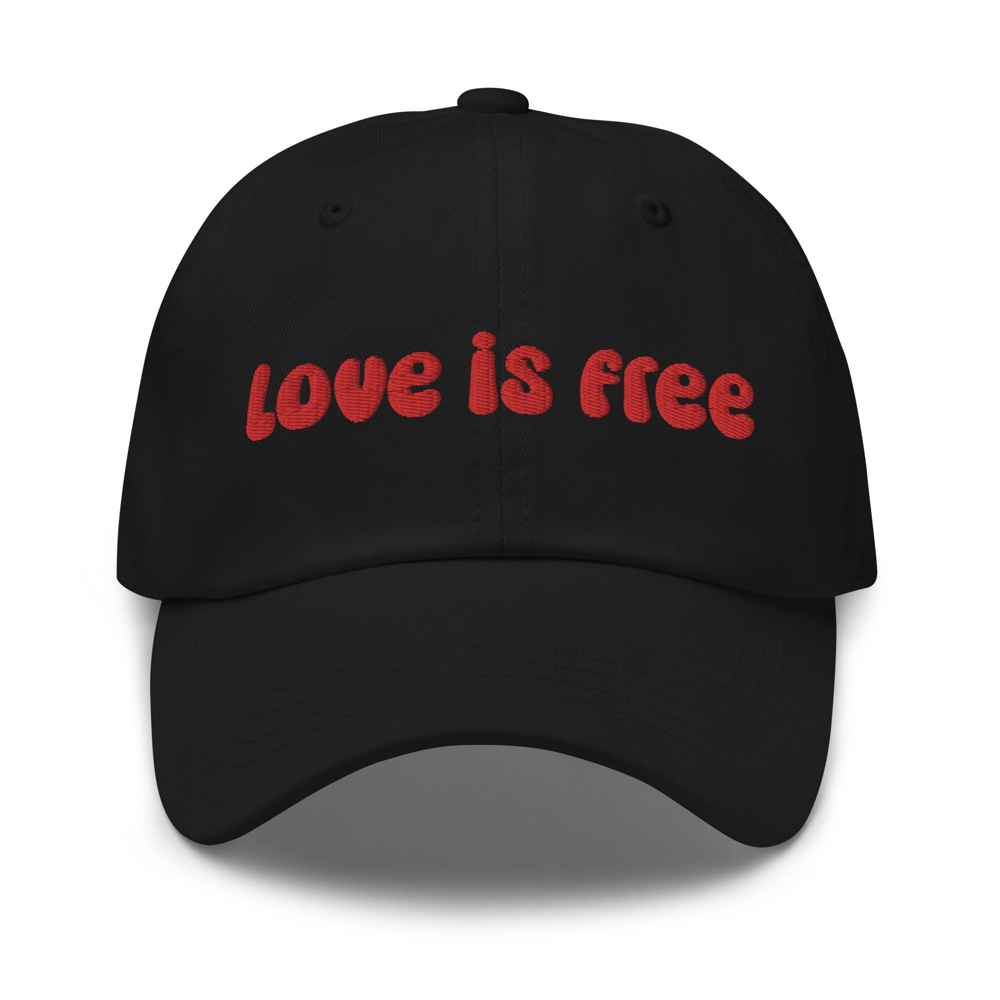 The Pridelity Love Is Free Cap, in a striking white color, is an ideal addition to pride outfits. It boasts the phrase 