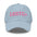 A white LGBTQ+ Cap by Pridelity, featuring pink lettering on the front, is perfect for enhancing pride outfits.