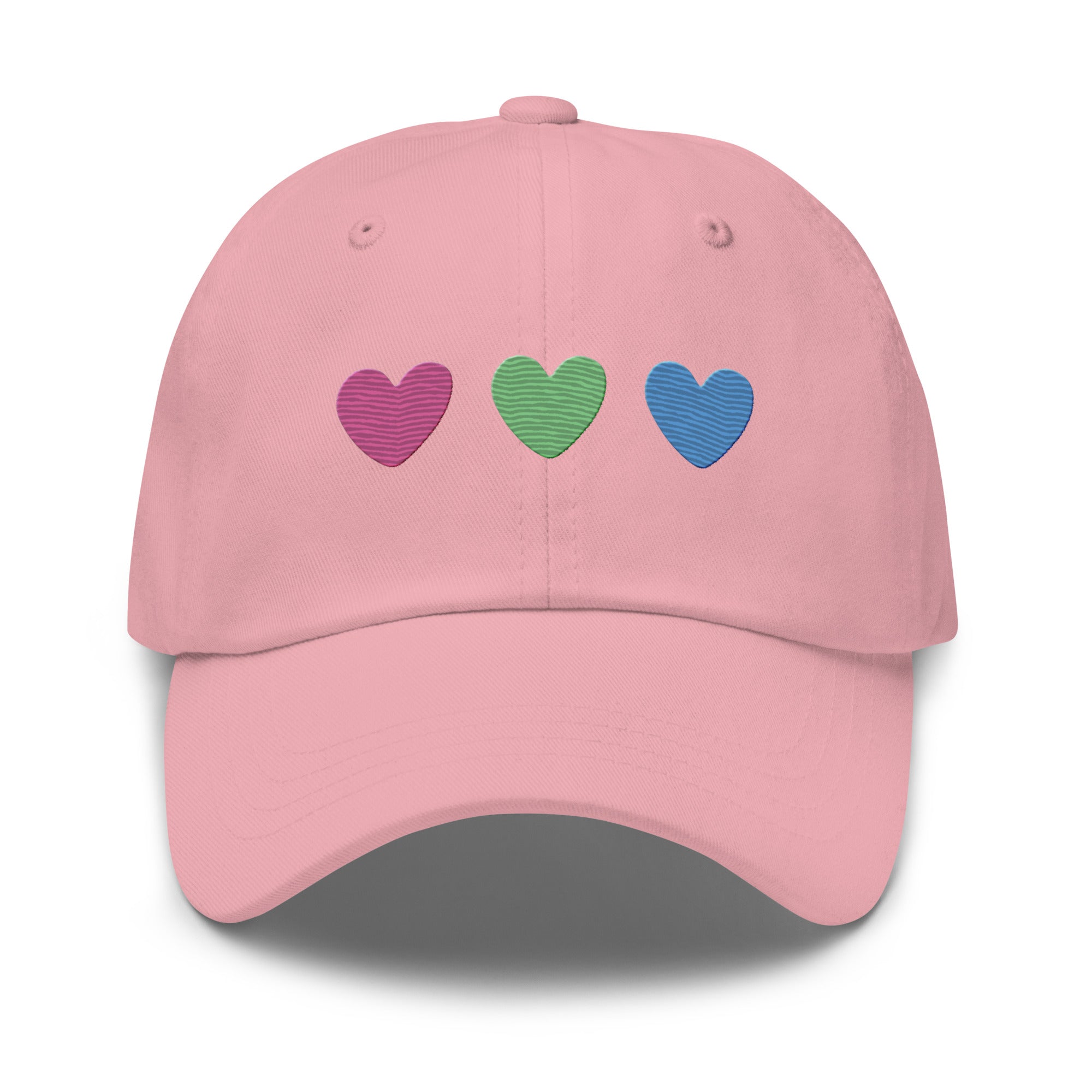 The Polysexual Hearts Cap by Pridelity is a black baseball cap ideal for pride outfits, featuring three embroidered hearts in pink, green, and blue arranged in a row on the front.