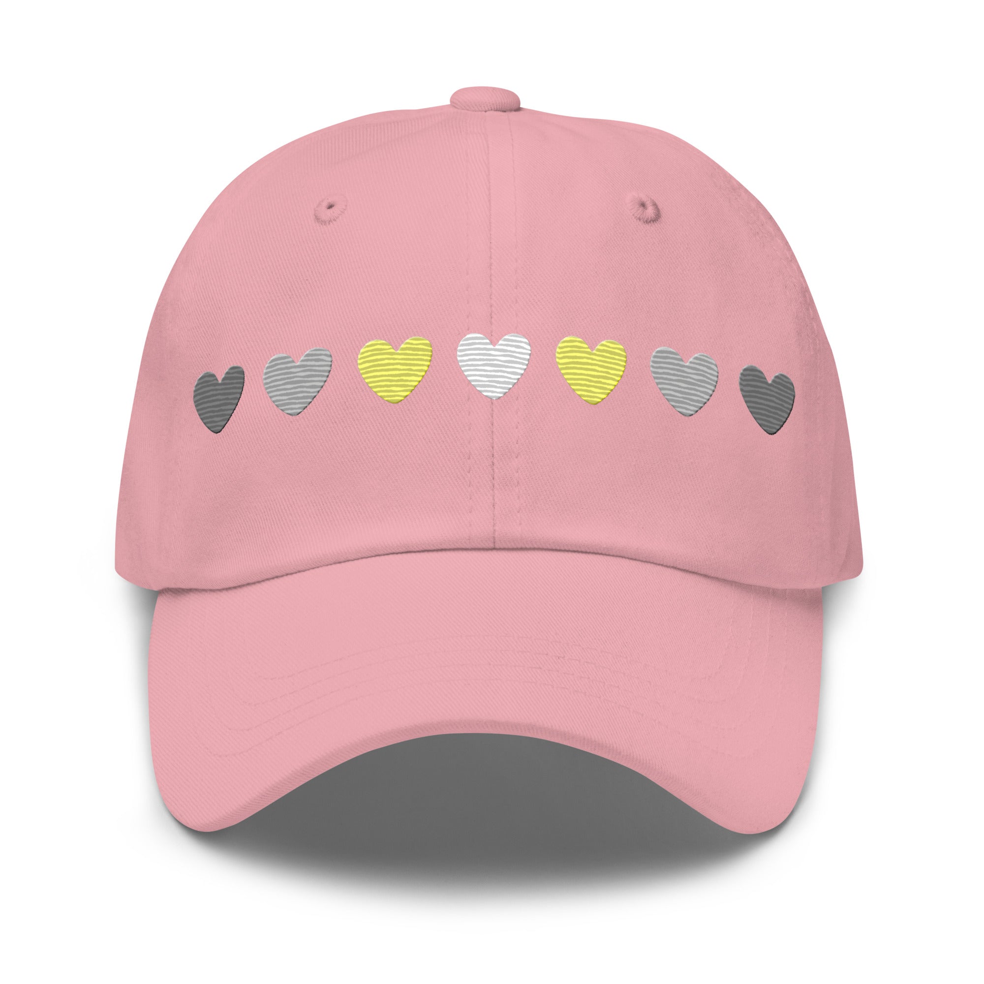 Introducing the Demigender Hearts Cap by Pridelity, a stylish black baseball cap ideal for pride outfits. It features a row of hearts embroidered on the front, transitioning seamlessly from gray on the left to vibrant yellow in the center, and back to gray on the right.