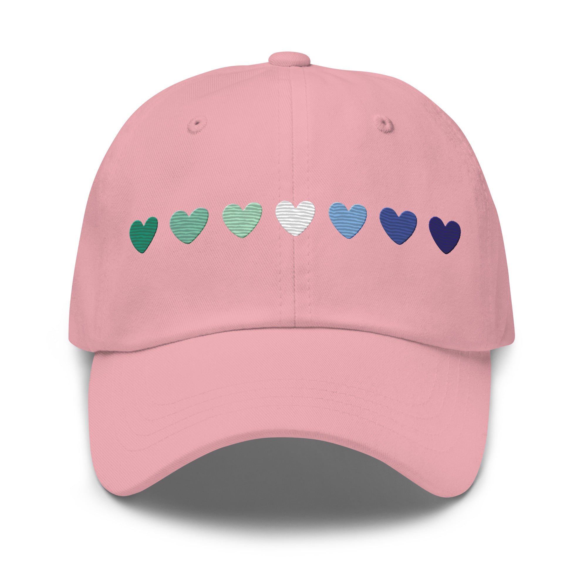 The Gay Men Hearts Cap by Pridelity is a black cap adorned with a row of seven hearts in gradient colors from green to blue, making it an ideal accessory for adding a subtle yet vibrant touch to pride outfits.