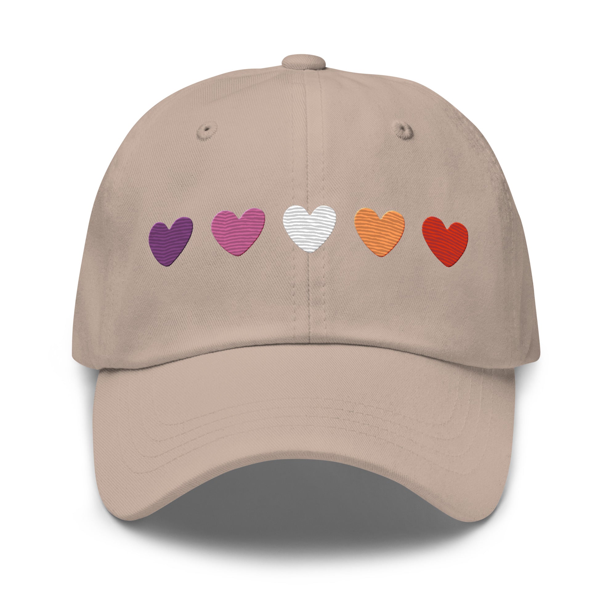 The Pridelity Lesbian Hearts Cap, in a vibrant pink hue, enhances pride outfits with its five embroidered hearts in shades of purple, lavender, white, orange, and red. Set against a plain background, this cap is the perfect accessory to celebrate love and diversity.