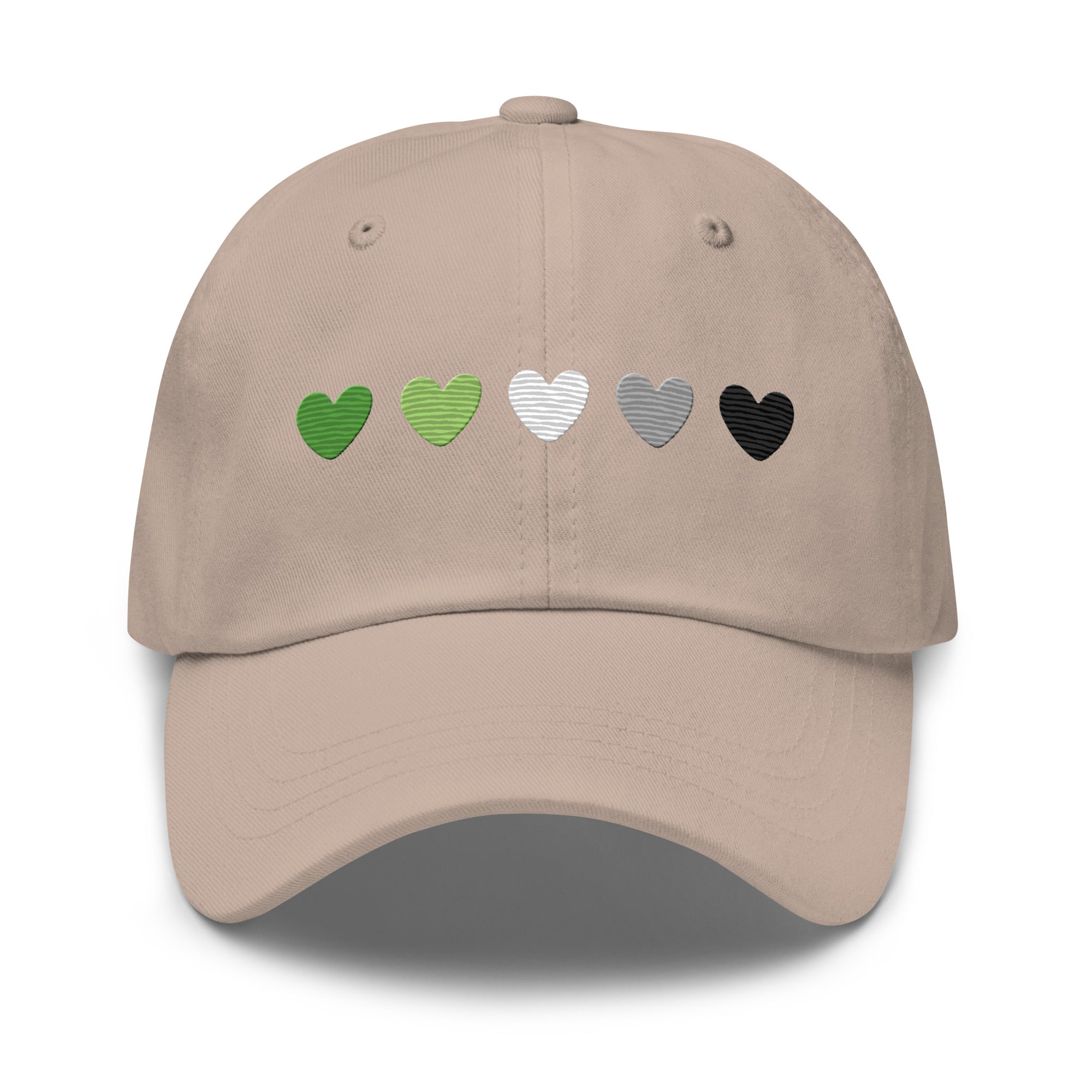 The Aromantic Hearts Cap by Pridelity, part of the Pride Collection, is a beige baseball cap featuring five hearts in a row colored dark green, light green, white, gray, and black to represent the aromantic pride flag.