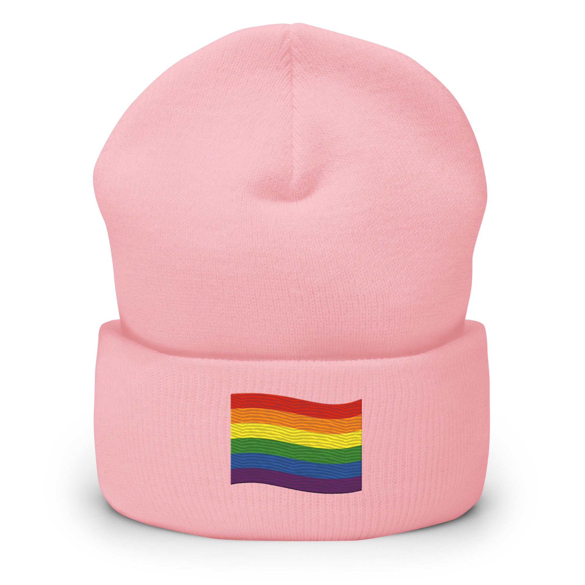 The Pride Flag Beanie by Pridelity is a white beanie adorned with an embroidered colorful rainbow flag on its folded brim, ideal for anyone looking for gay clothing that celebrates identity. The vibrant flag showcases red, orange, yellow, green, blue, and purple stripes representing LGBTQ+ pride.