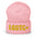 Pridelity's LGBTQ+ Beanie in red features "LGBTQ+" in yellow letters on the front, making it an ideal choice for those embracing gay clothing styles.