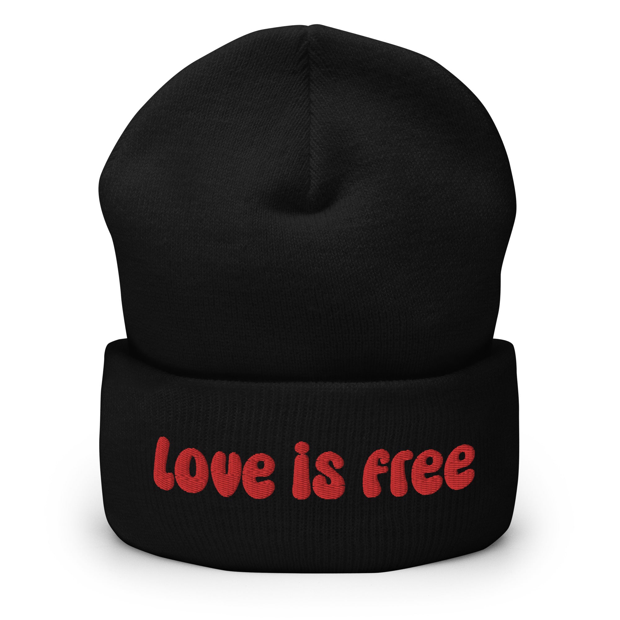 The Love Is Free Beanie by Pridelity is a baby pink accessory that boldly features the phrase 