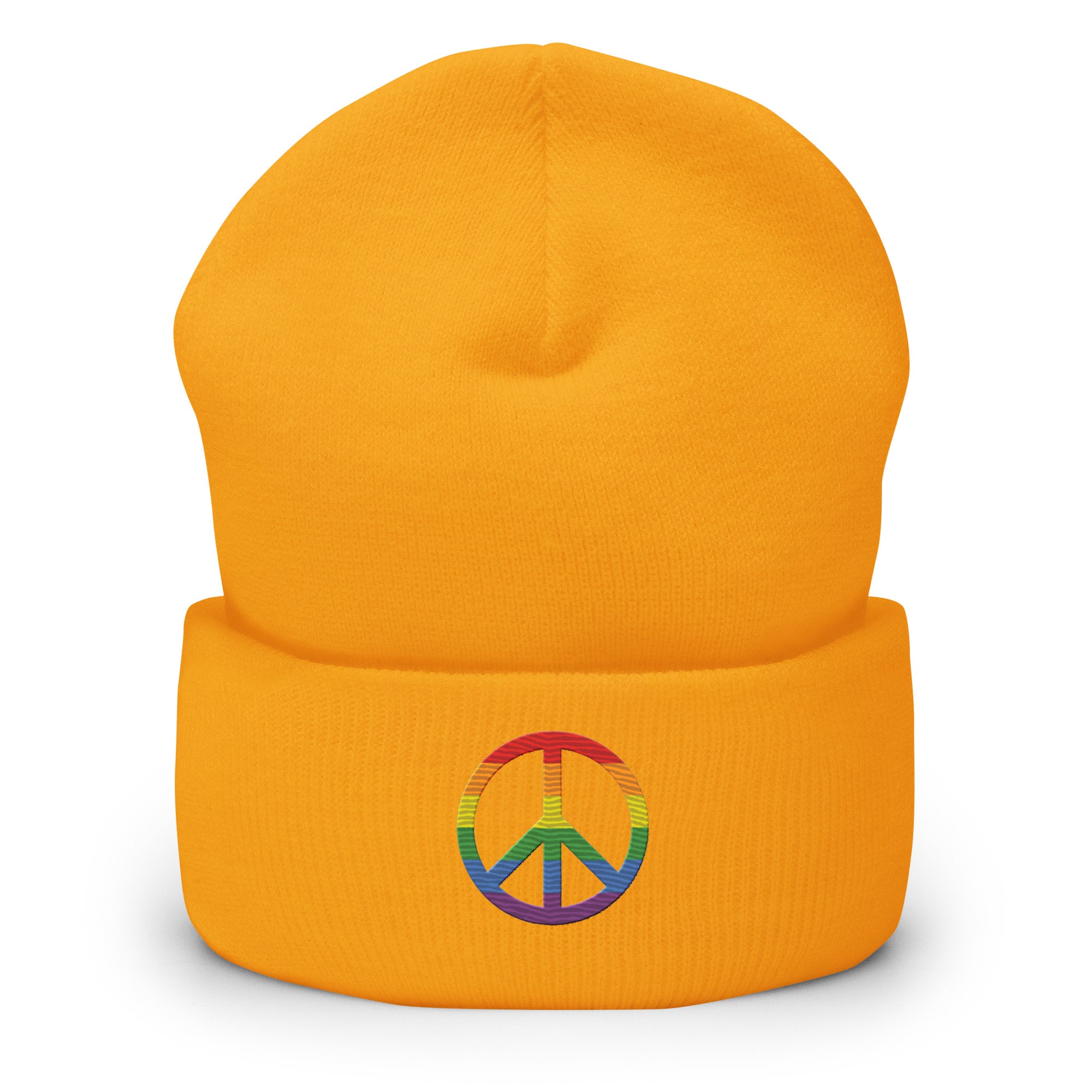 The Pridelity Peace Beanie, in black, showcases a vibrant rainbow-colored peace symbol on the front, making it the perfect accessory to add a touch of pride to any outfit. It is elegantly displayed against a plain white background.