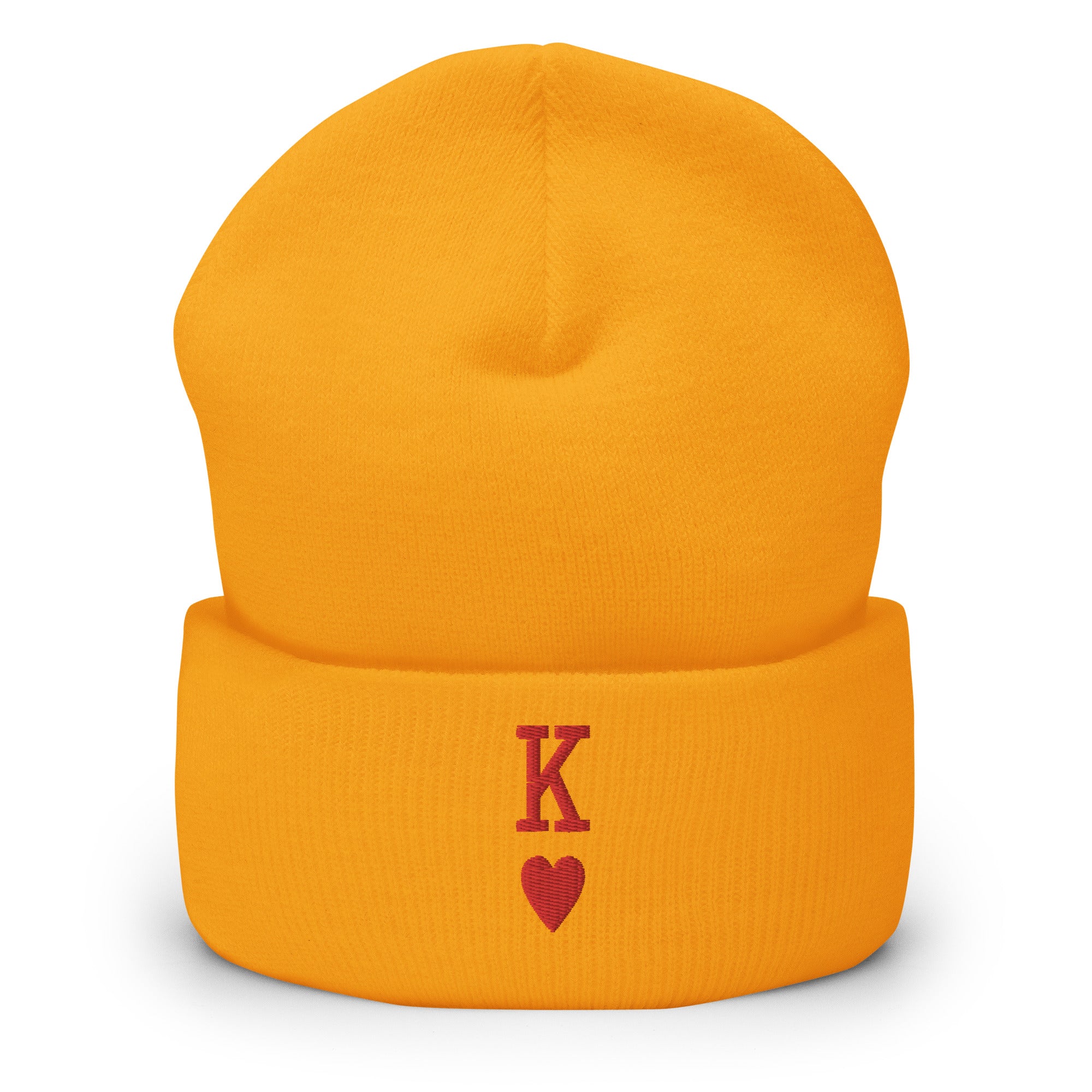 The King Beanie by Pridelity is a white beanie adorned with a red 