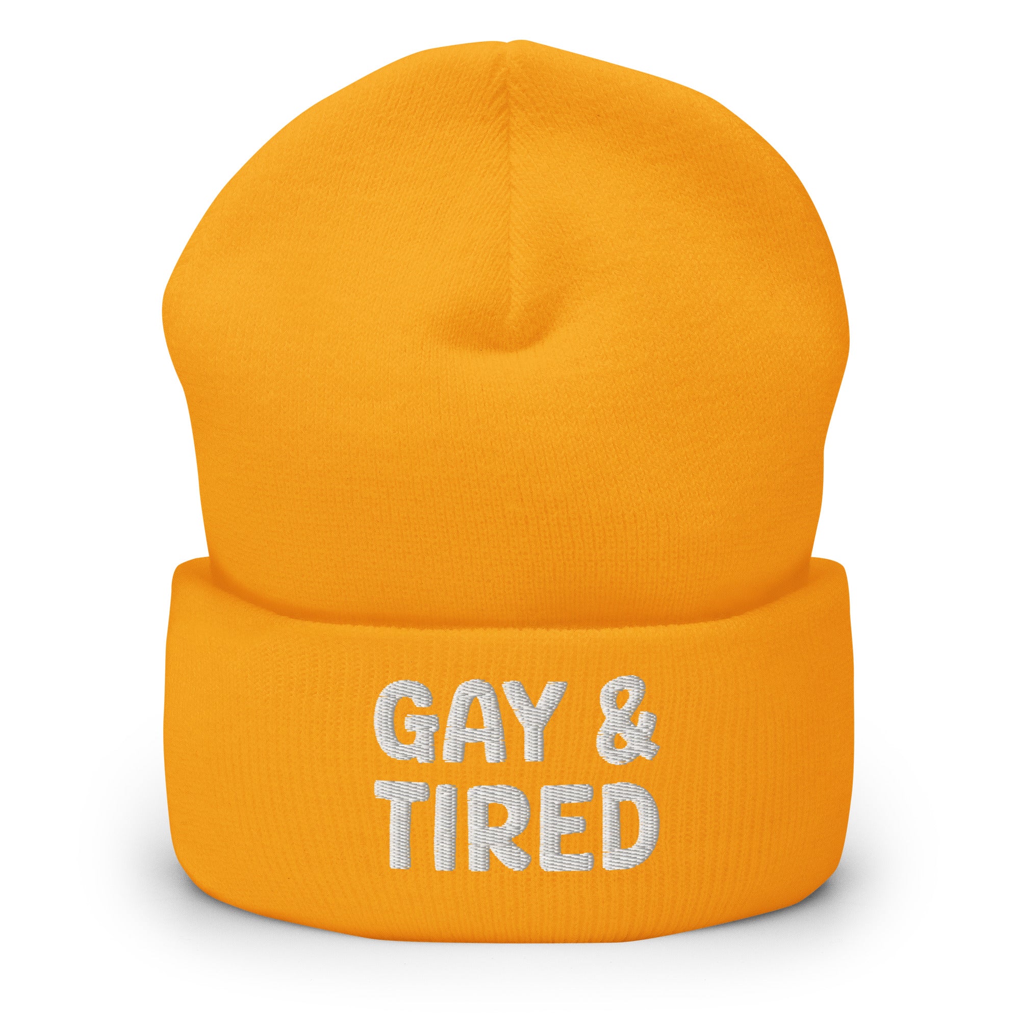 The Gay & Tired Beanie by Pridelity is a stylish accessory for showcasing your individuality, featuring white embroidered text on a black background that boldly states 