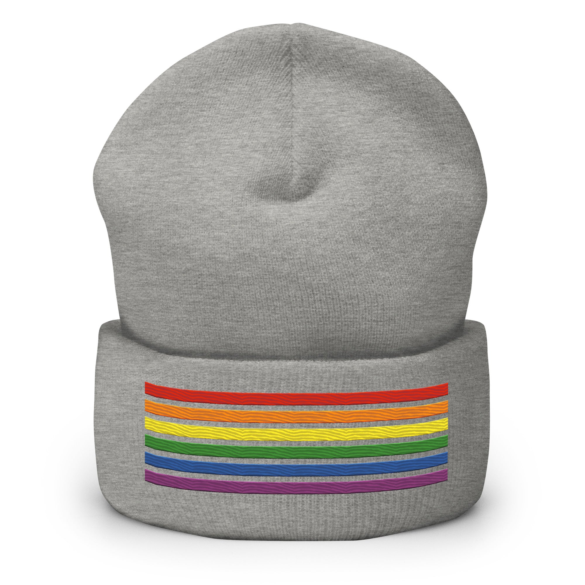 Introducing the Rainbow Beanie from Pridelity, a highlight in gay clothing that features vivid horizontal stripes in red, orange, yellow, green, blue, and purple on a white background.