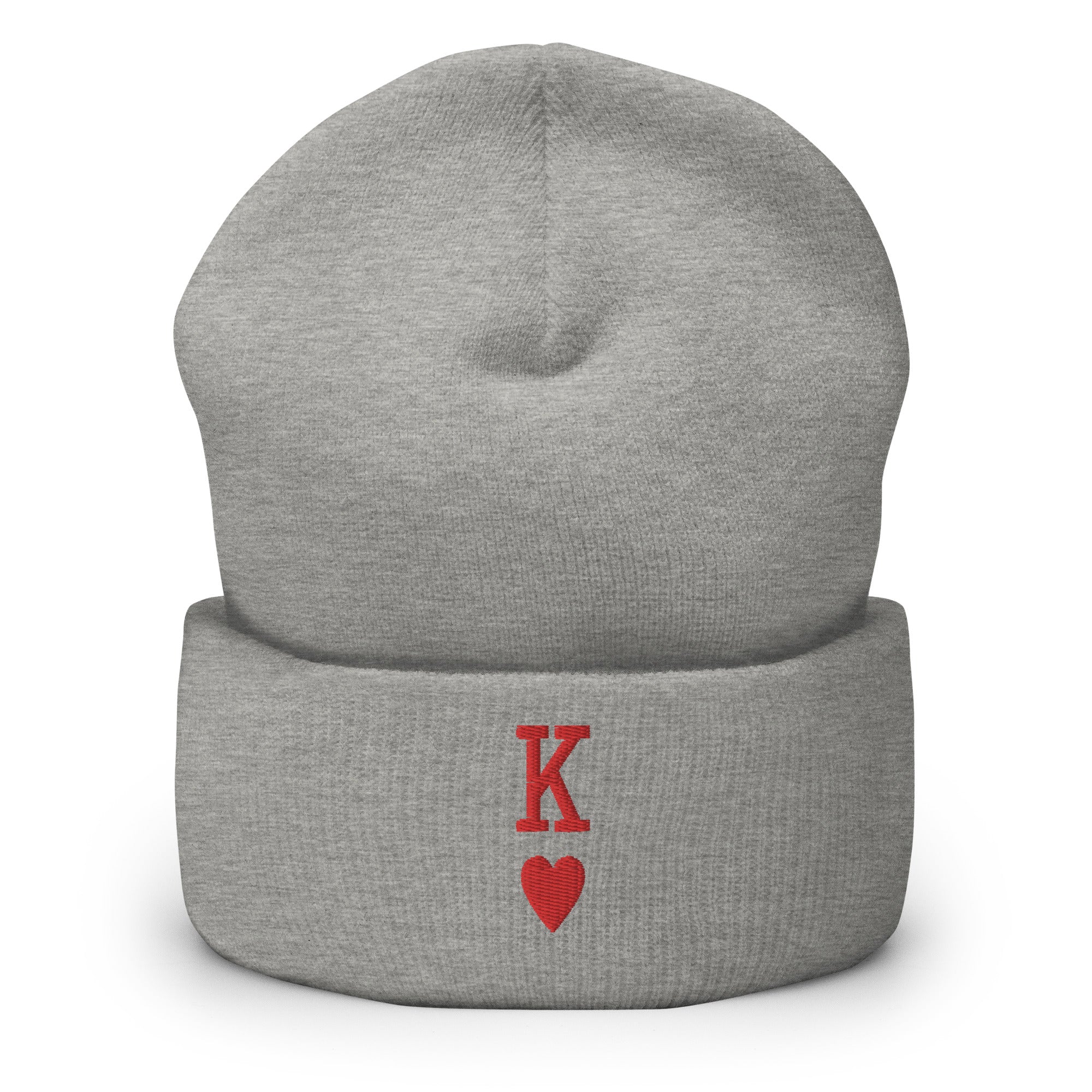 The King Beanie by Pridelity is a white beanie adorned with a red 