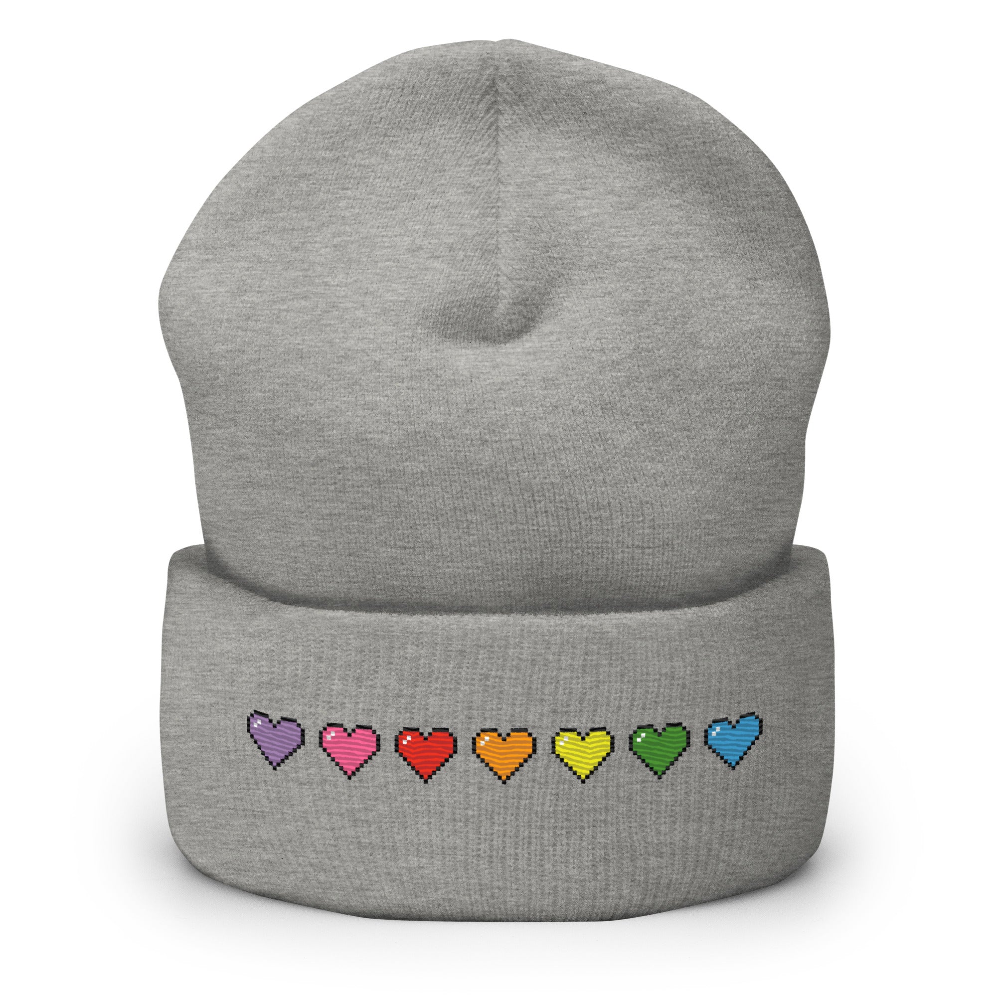 The Pixel Hearts Beanie by Pridelity, in heather grey, celebrates gay pride with a horizontal row of seven stitched pixelated retro gaming-style hearts in the rainbow colors: red, orange, yellow, green, light blue, dark blue, and purple.