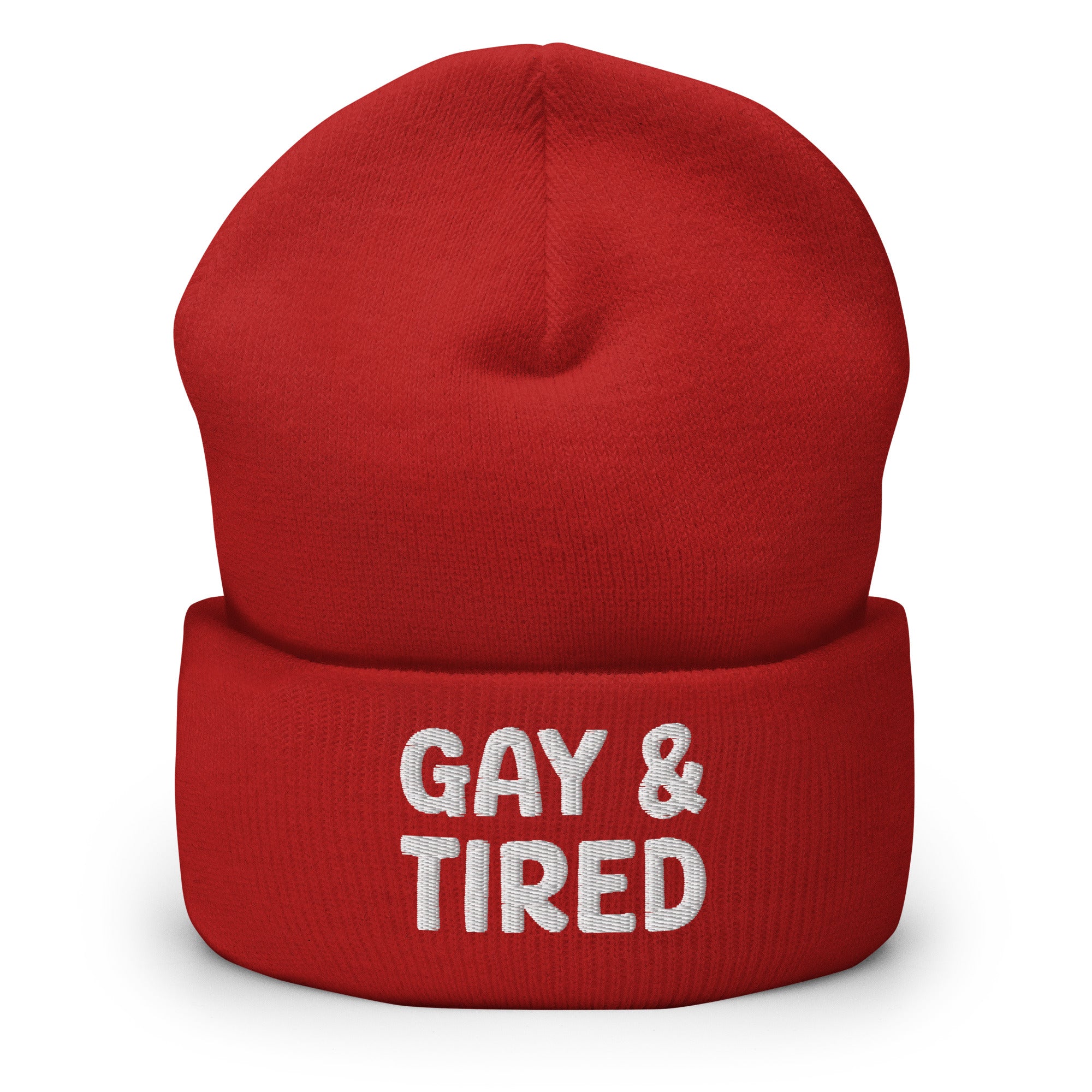 The Gay & Tired Beanie by Pridelity is a stylish accessory for showcasing your individuality, featuring white embroidered text on a black background that boldly states 