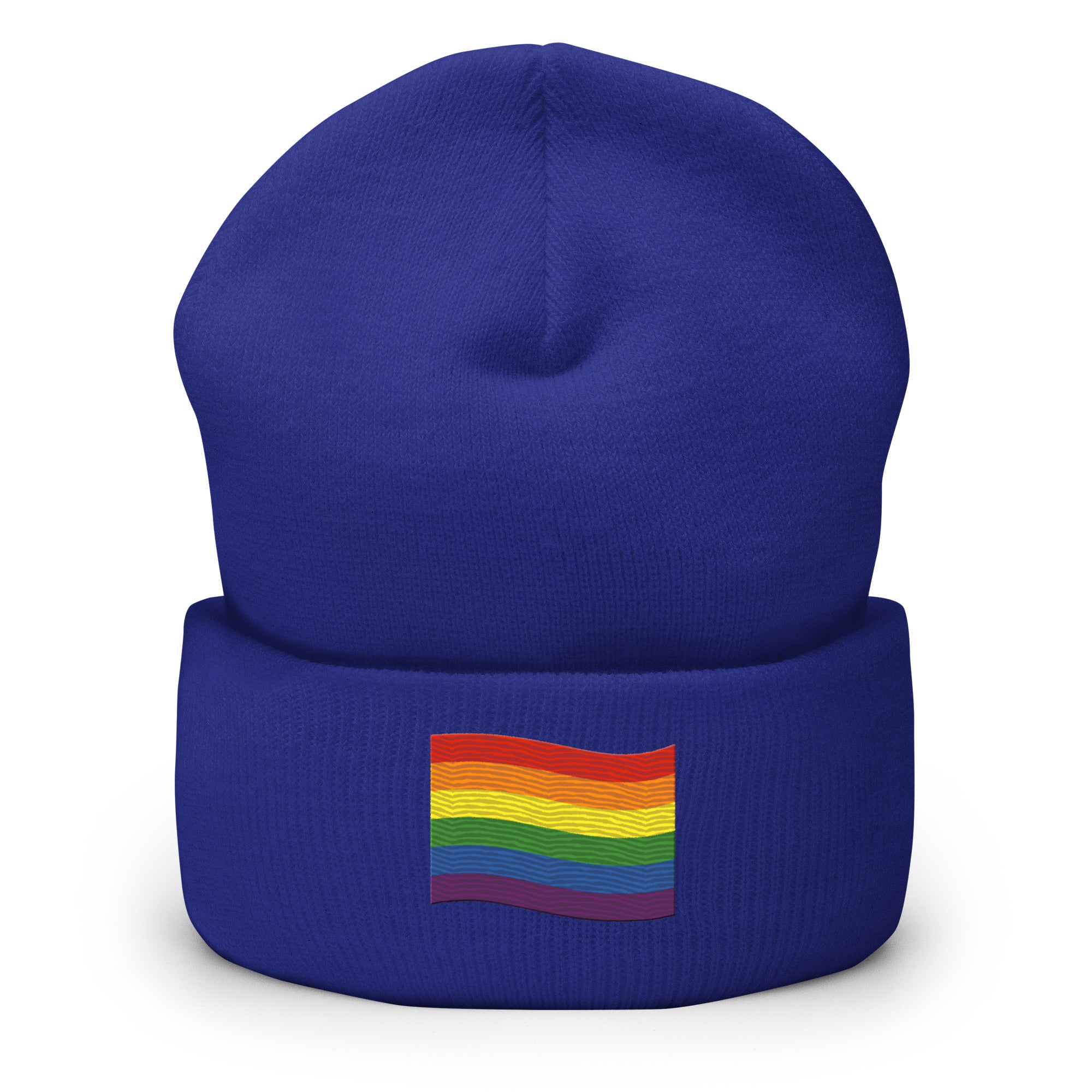 The Pride Flag Beanie by Pridelity is a white beanie adorned with an embroidered colorful rainbow flag on its folded brim, ideal for anyone looking for gay clothing that celebrates identity. The vibrant flag showcases red, orange, yellow, green, blue, and purple stripes representing LGBTQ+ pride.