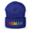 Discover the Human Beanie by Pridelity, a stylish white accessory featuring "HUMAN" embroidered in vibrant rainbow colors, capturing the spirit of gay clothing.