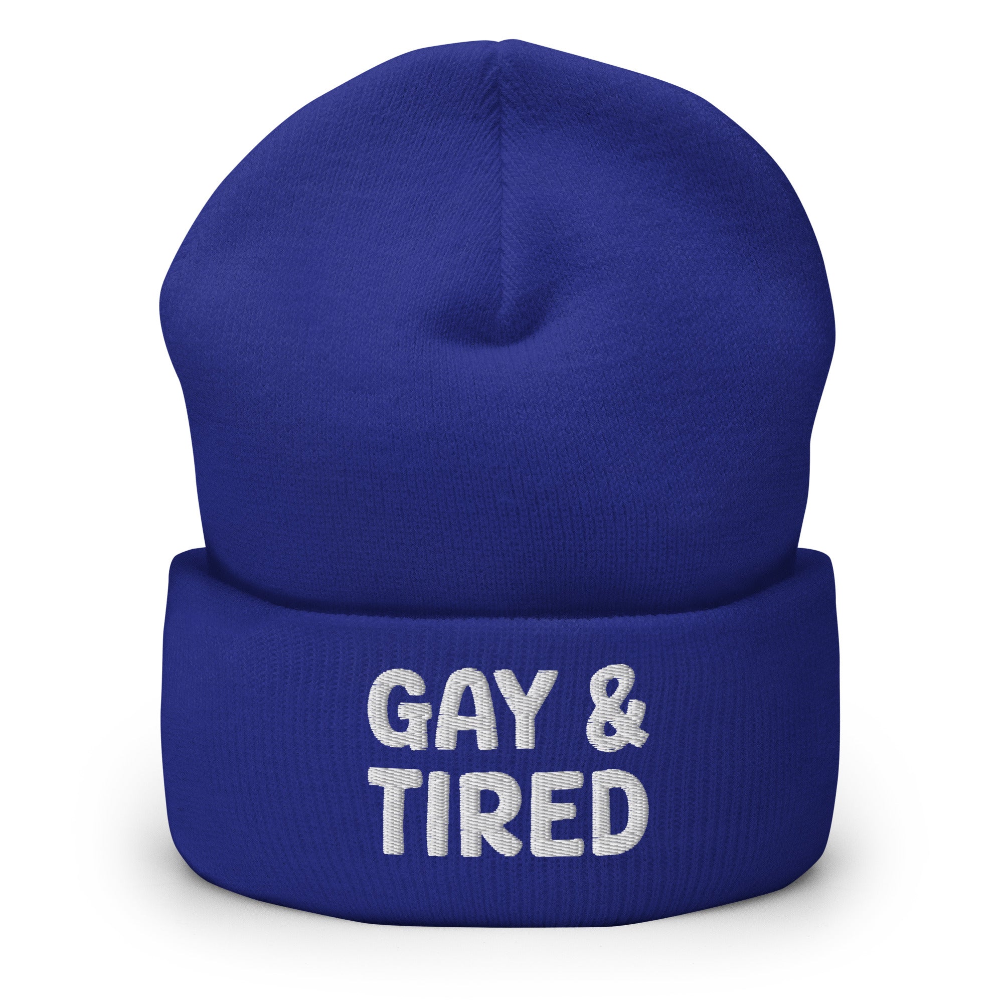 The Gay & Tired Beanie by Pridelity is a stylish accessory for showcasing your individuality, featuring white embroidered text on a black background that boldly states 