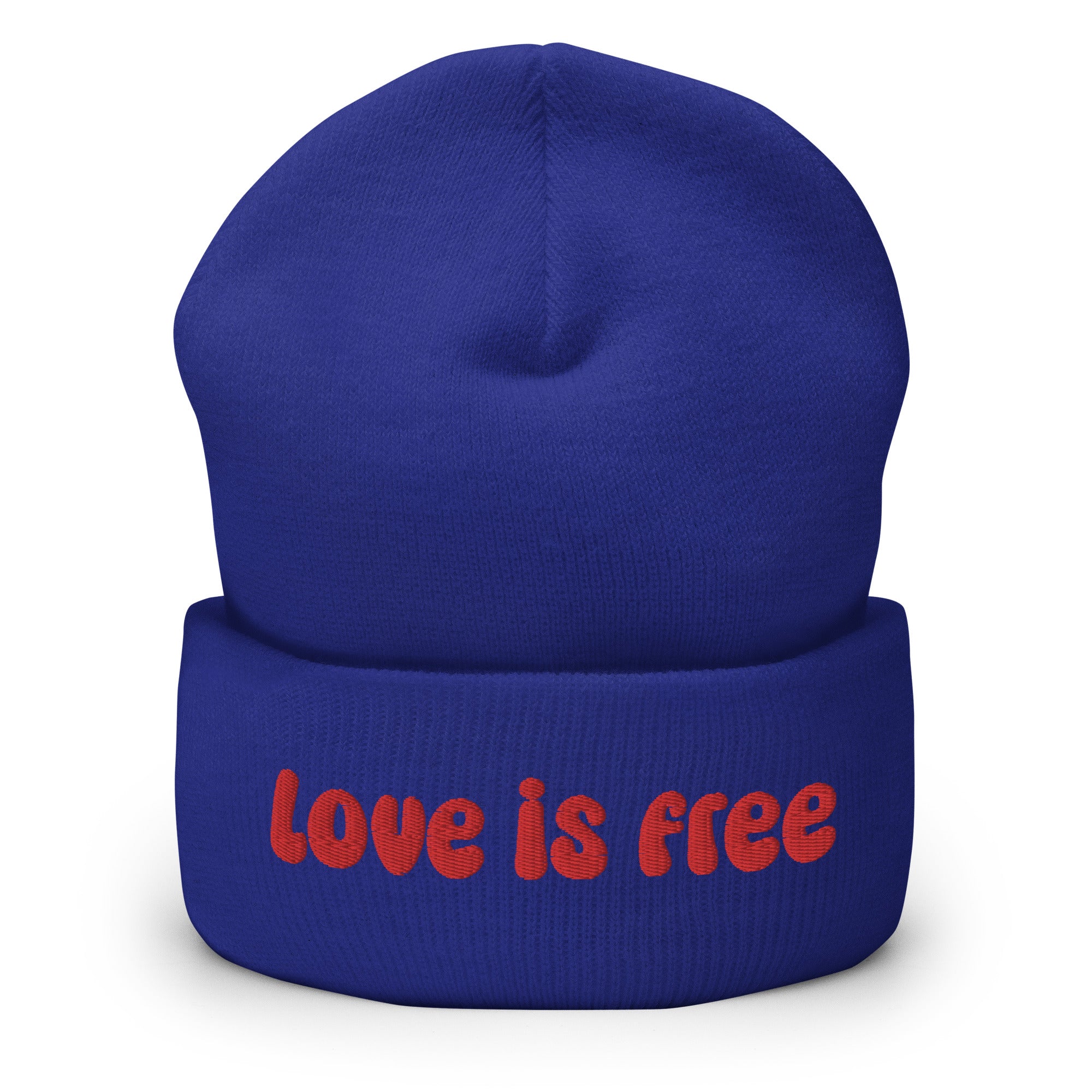 The Love Is Free Beanie by Pridelity is a baby pink accessory that boldly features the phrase 