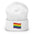 The Pride Flag Beanie by Pridelity is a white beanie adorned with an embroidered colorful rainbow flag on its folded brim, ideal for anyone looking for gay clothing that celebrates identity. The vibrant flag showcases red, orange, yellow, green, blue, and purple stripes representing LGBTQ+ pride.