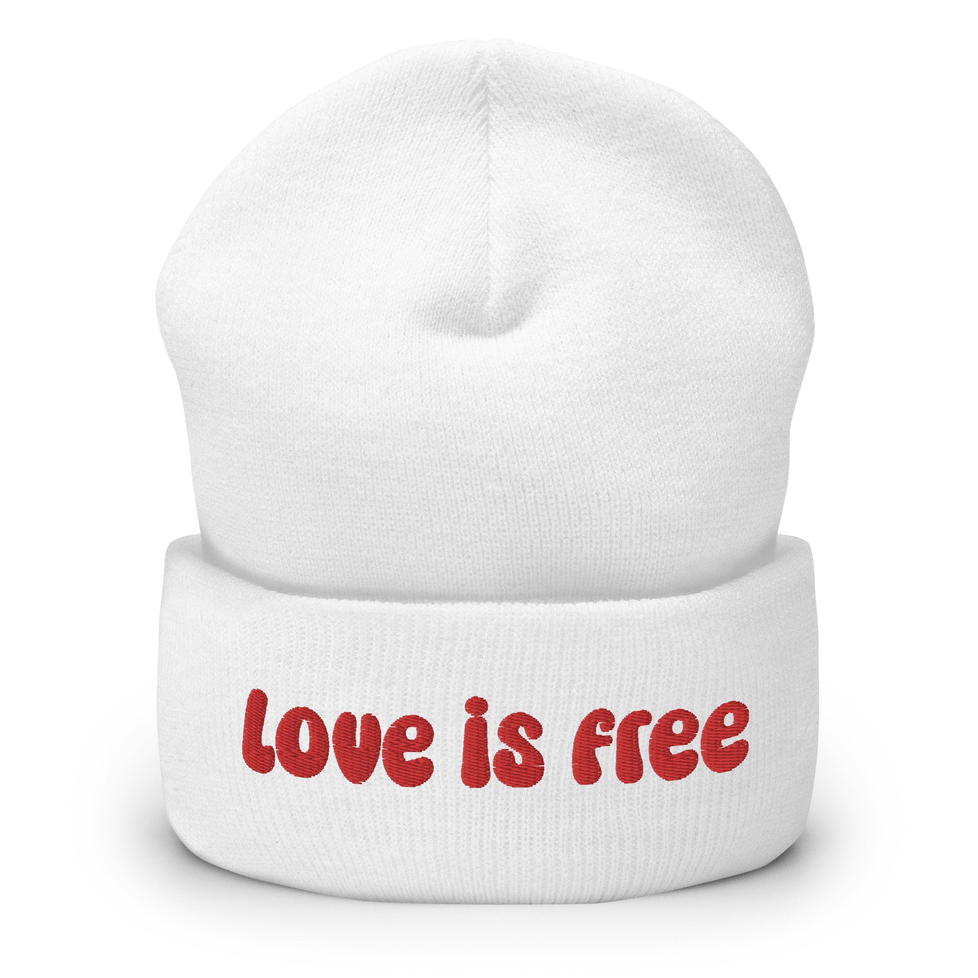 The Love Is Free Beanie by Pridelity is a baby pink accessory that boldly features the phrase 