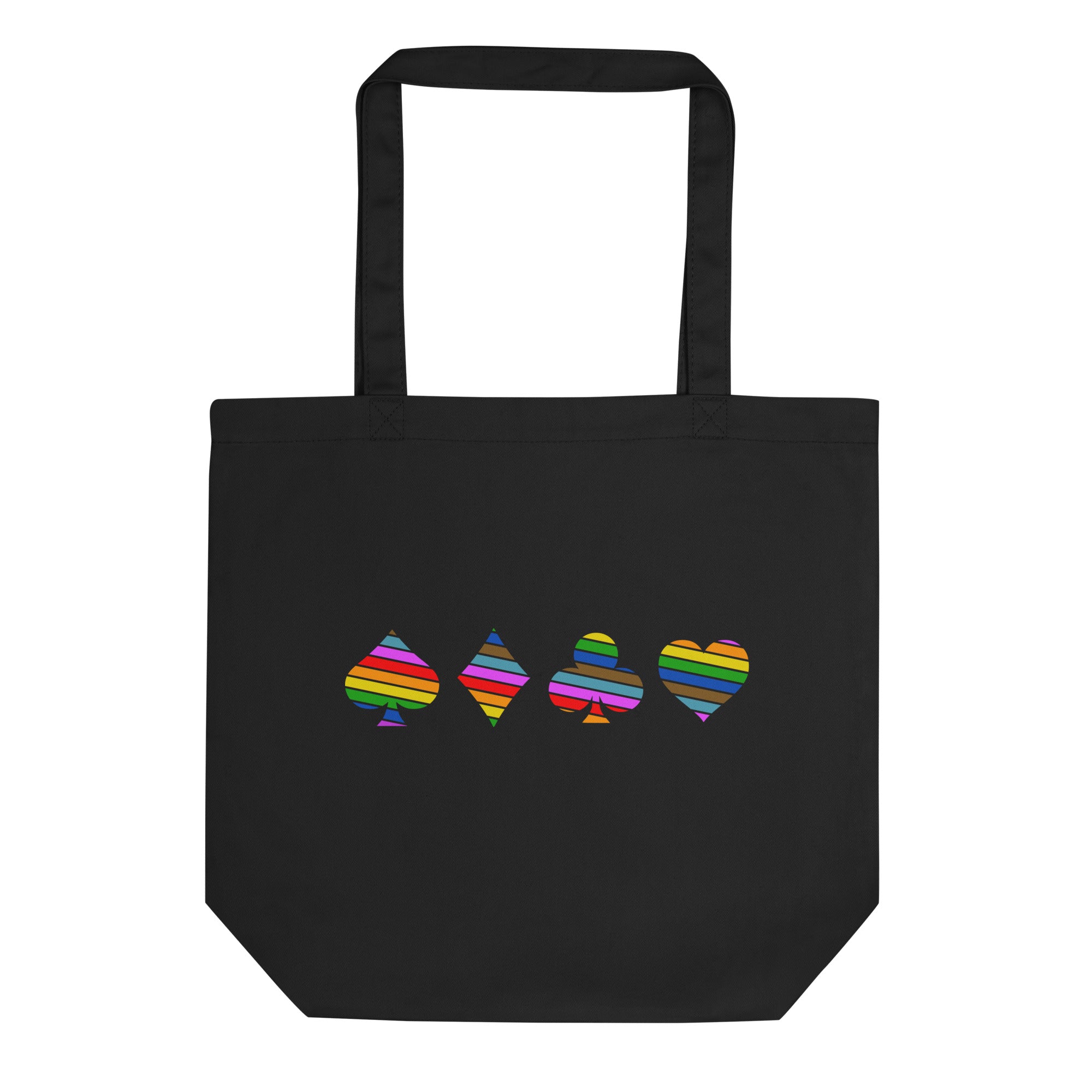 The Deck of Pride Tote Bag by Pridelity showcases vibrant rainbow-striped designs of spades, diamonds, clubs, and hearts in the center on a black background. This bag features two handles and an elegantly minimalist style, making it a standout piece of Pride merchandise.