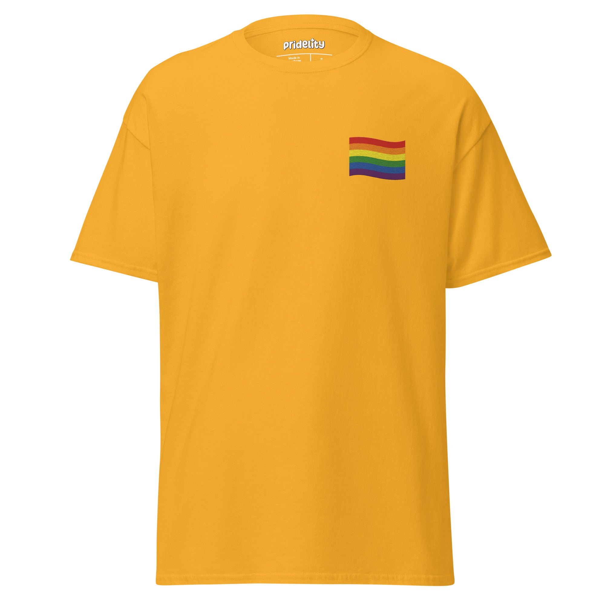 A Pride Flag T-Shirt by Pridelity in white showcases a small rainbow flag graphic on the upper left chest area, where the plain background accentuates the vibrant flag design.