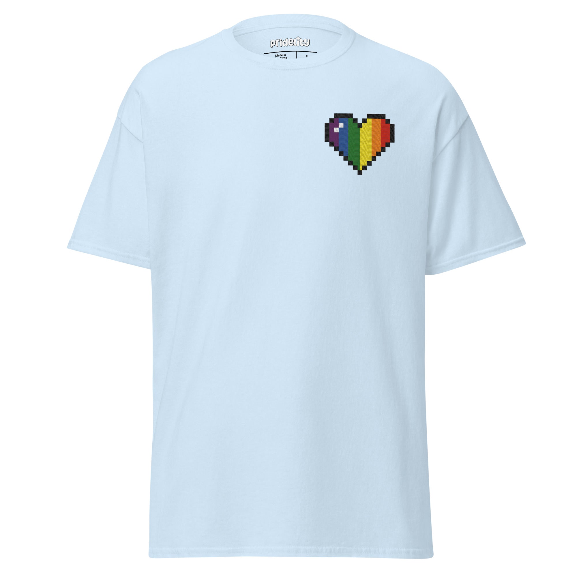 The Pixel Heart T-Shirt by Pridelity is a white shirt featuring a pixelated heart design in the upper left corner, with vertical sections of vibrant colors: black, brown, red, orange, yellow, green, blue, and purple.