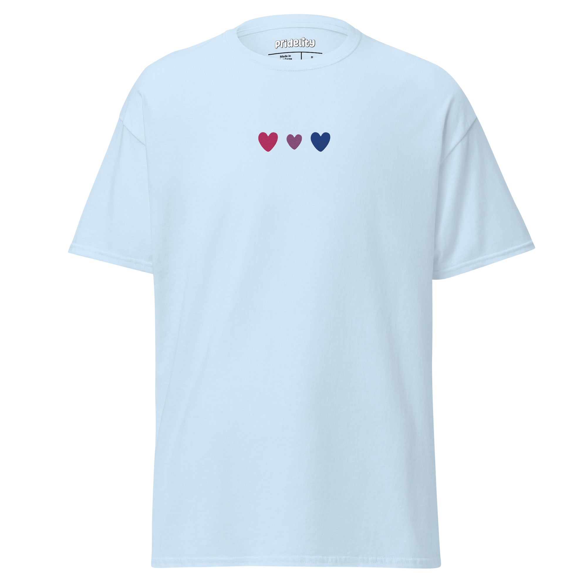 The beige Bisexual Love T-Shirt from Pridelity's Pride Collection features three small heart symbols across the chest: one red, one pink, and one dark blue.