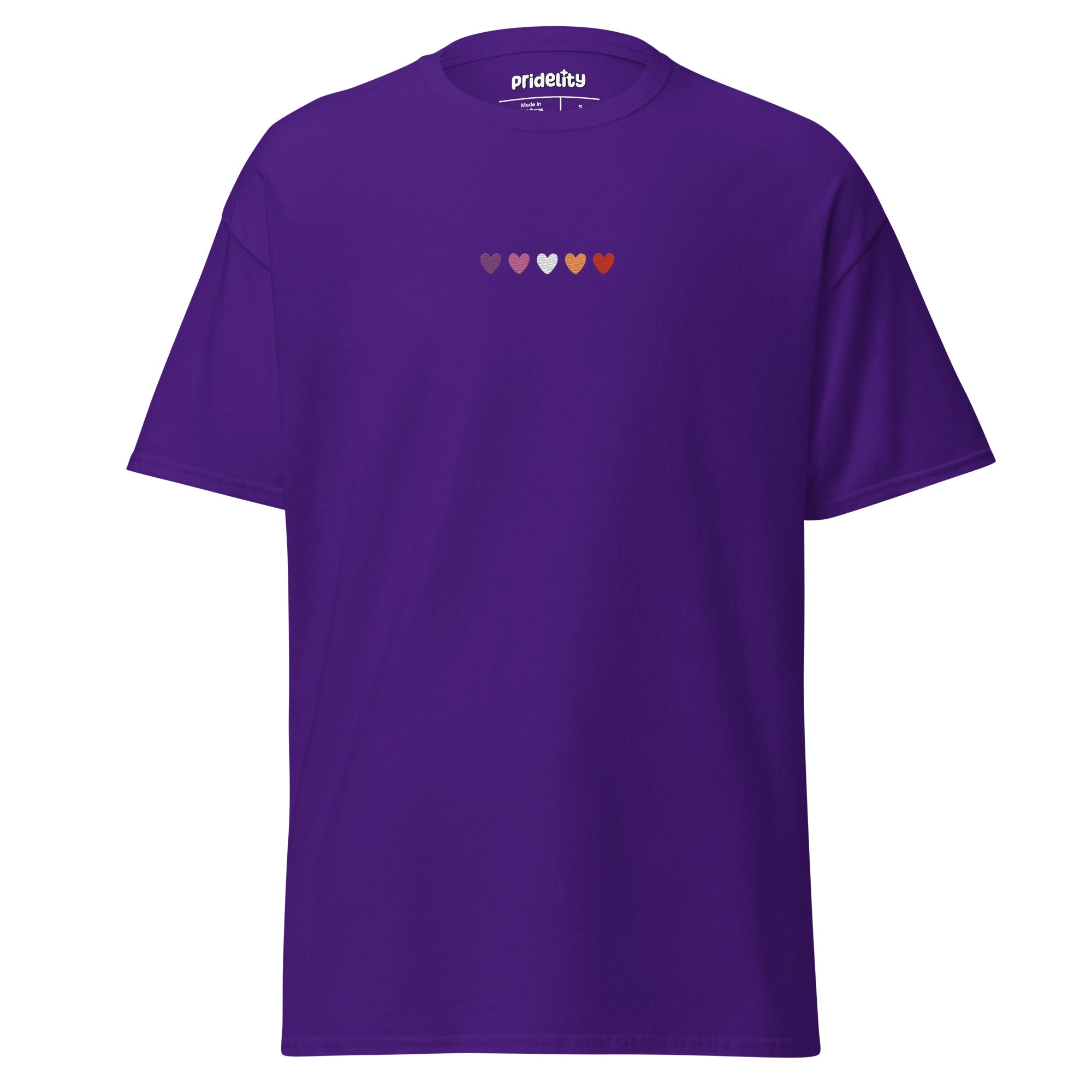 A maroon t-shirt called the Lesbian Love T-Shirt features six small hearts across the chest, each in different colors: purple, blue, teal, green, orange, and yellow. The brand name 