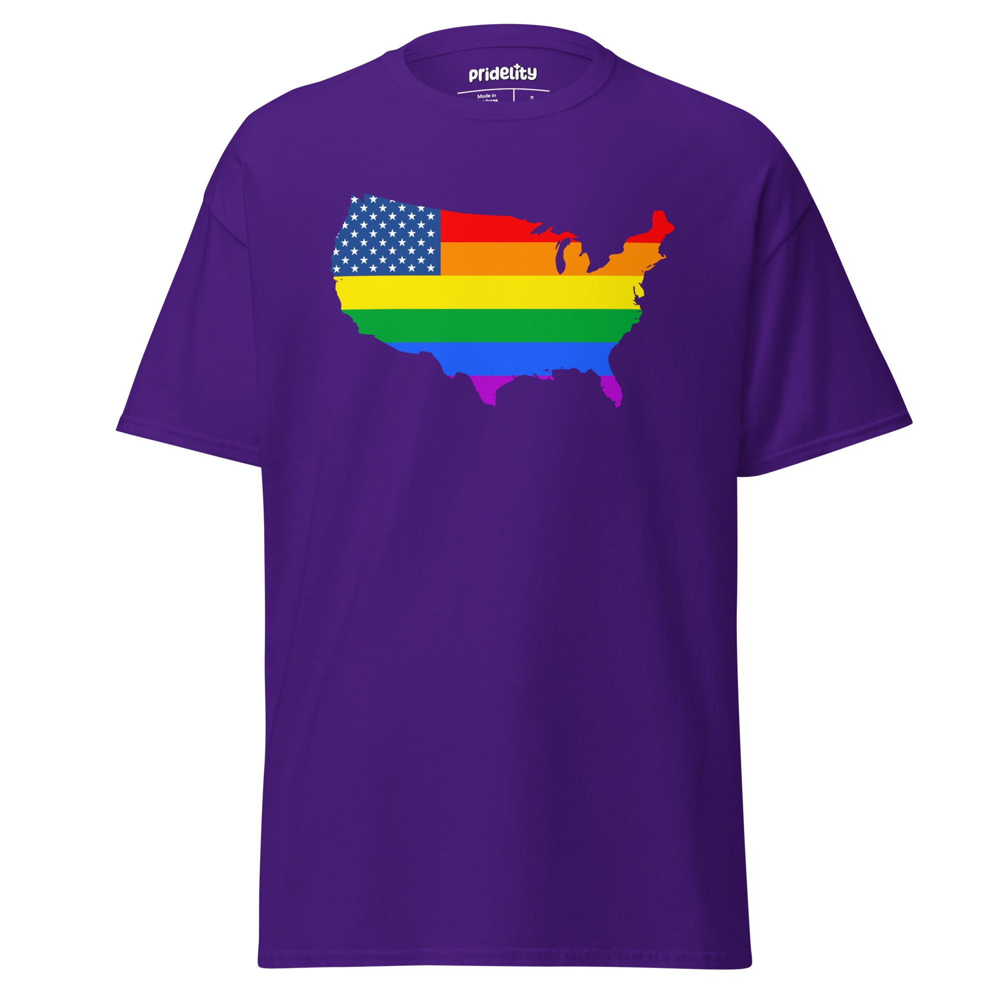 The US Map Pride T-Shirt by Pridelity features a graphic of the United States map, skillfully combining the American flag with vibrant rainbow colors to represent unity and diversity. This T-shirt comes in white.