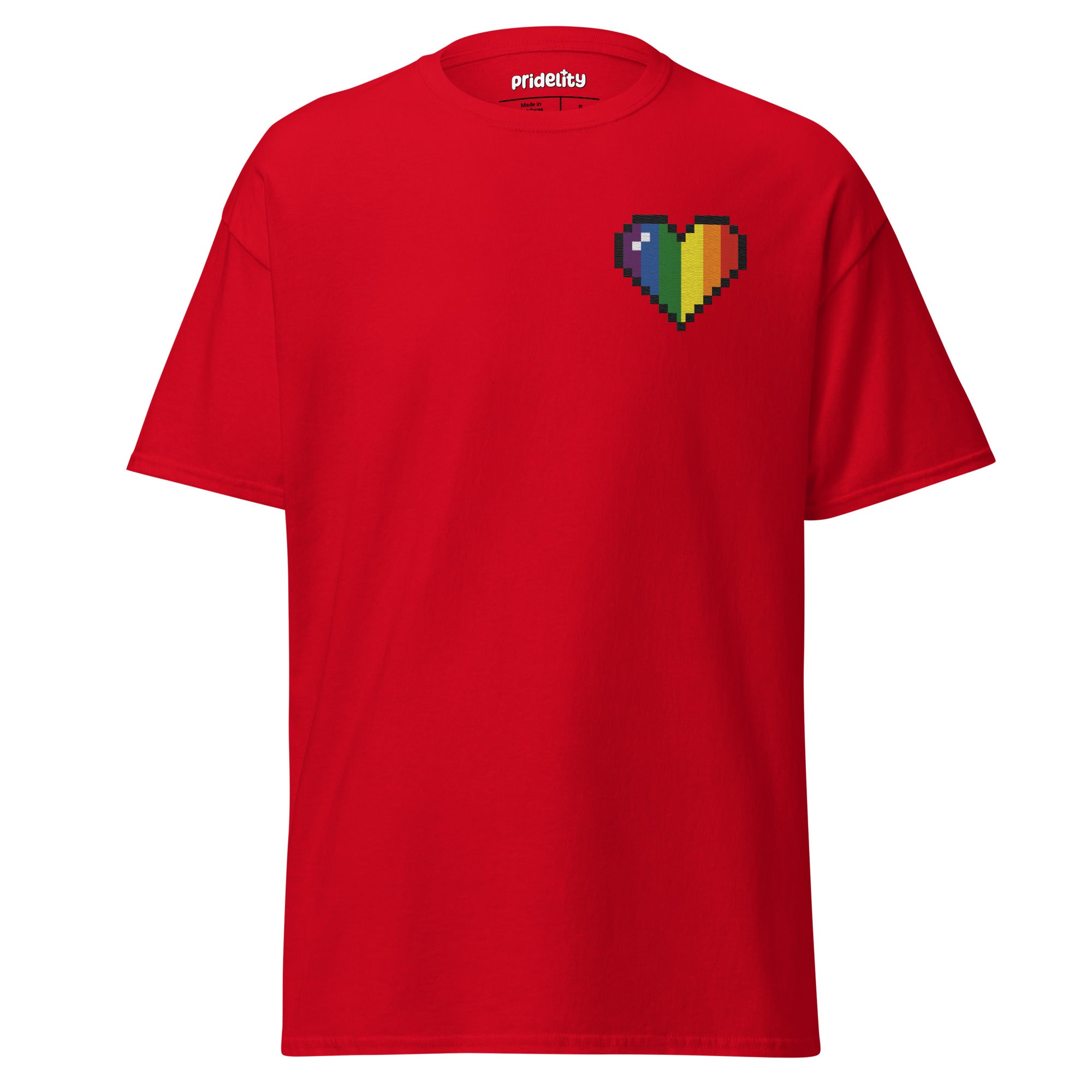 The Pixel Heart T-Shirt by Pridelity is a white shirt featuring a pixelated heart design in the upper left corner, with vertical sections of vibrant colors: black, brown, red, orange, yellow, green, blue, and purple.