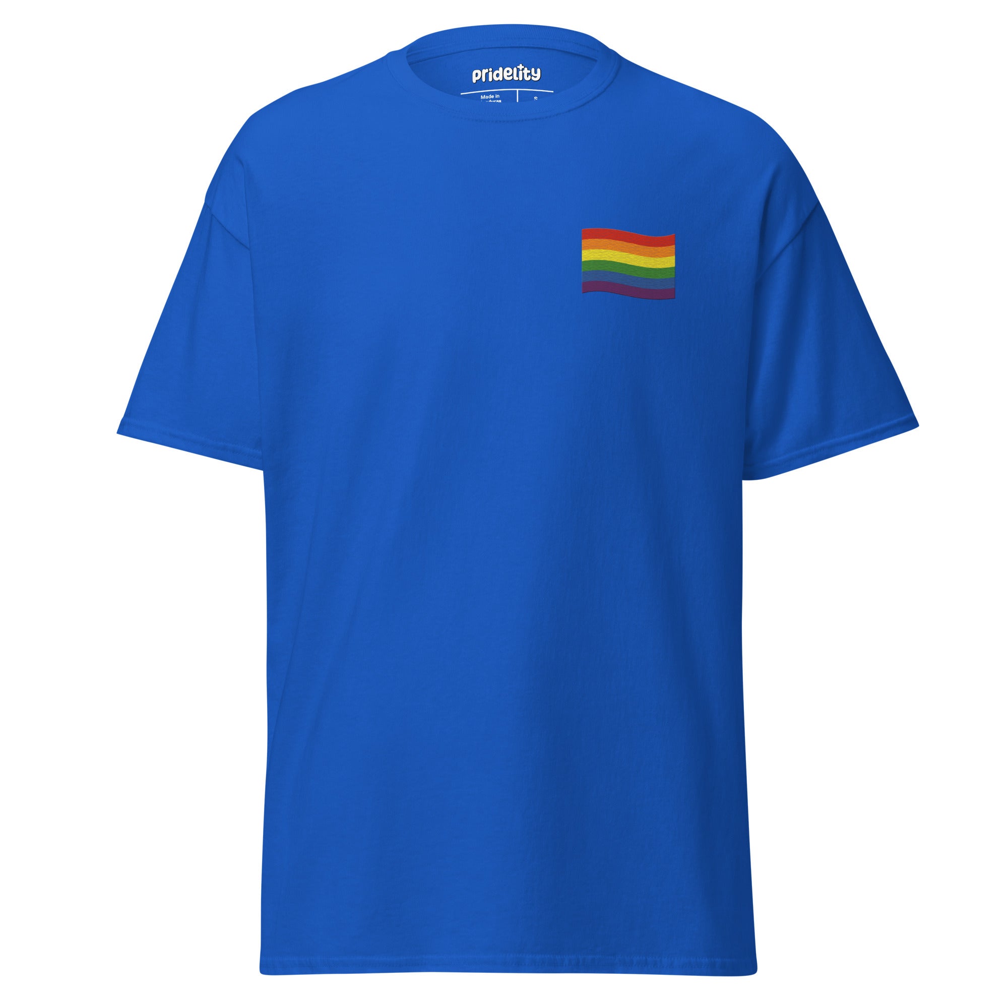 A Pride Flag T-Shirt by Pridelity in white showcases a small rainbow flag graphic on the upper left chest area, where the plain background accentuates the vibrant flag design.