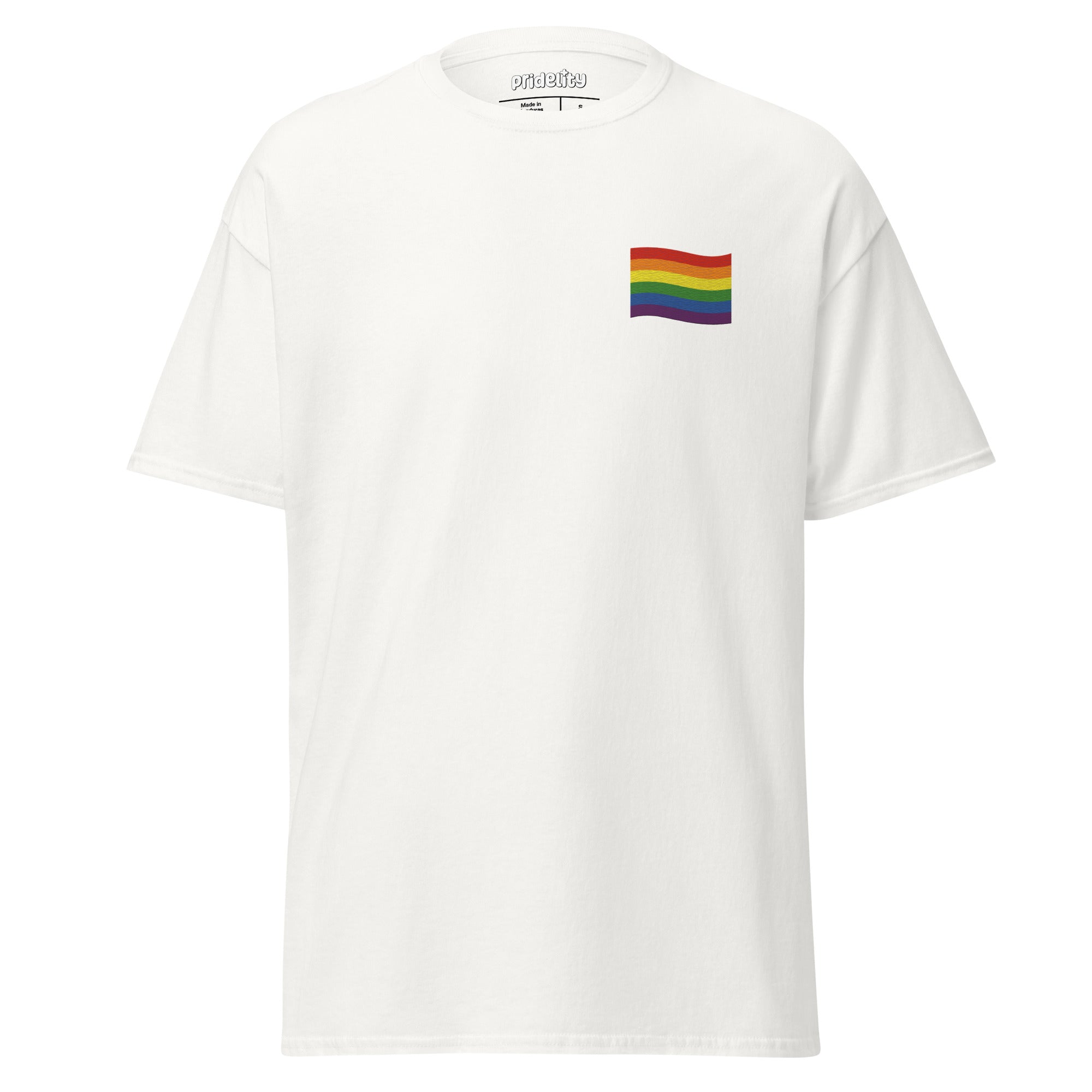 A Pride Flag T-Shirt by Pridelity in white showcases a small rainbow flag graphic on the upper left chest area, where the plain background accentuates the vibrant flag design.