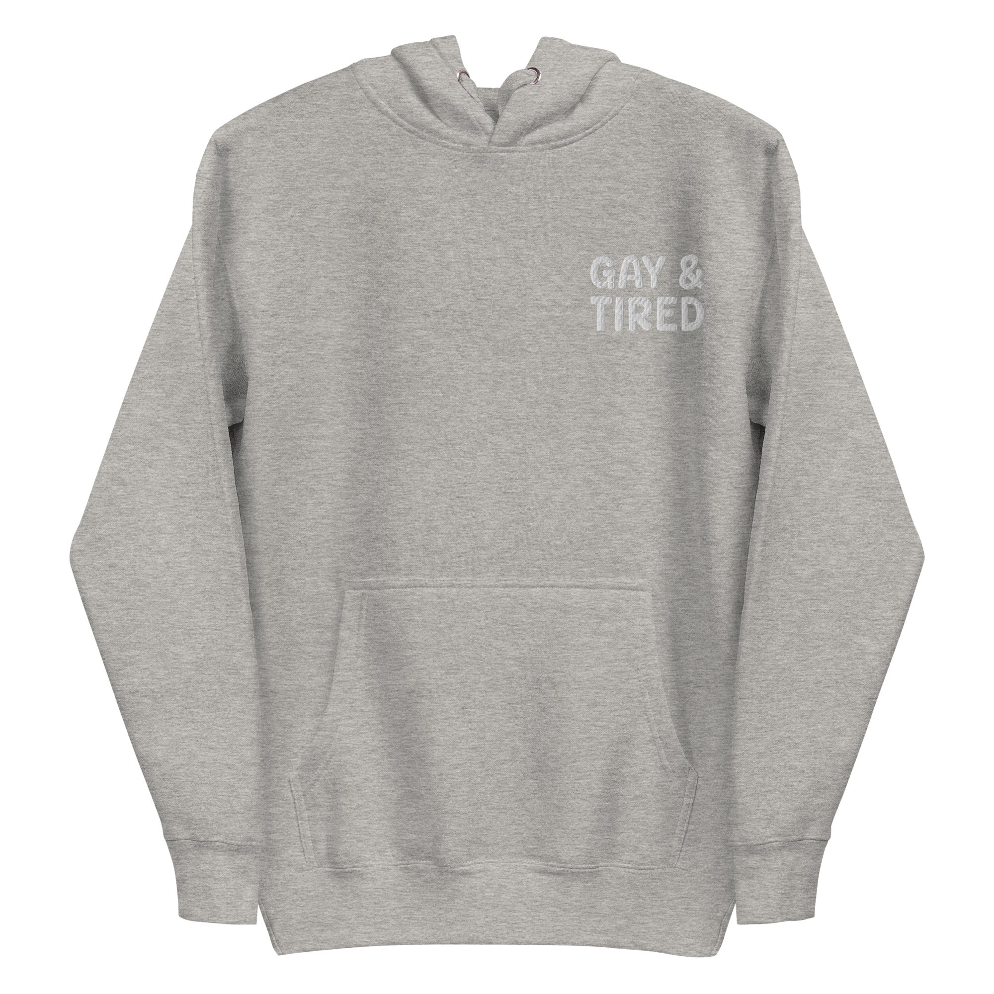 The Gay & Tired Hoodie by Pridelity is a black pride hoodie featuring white text on the upper left side that reads 