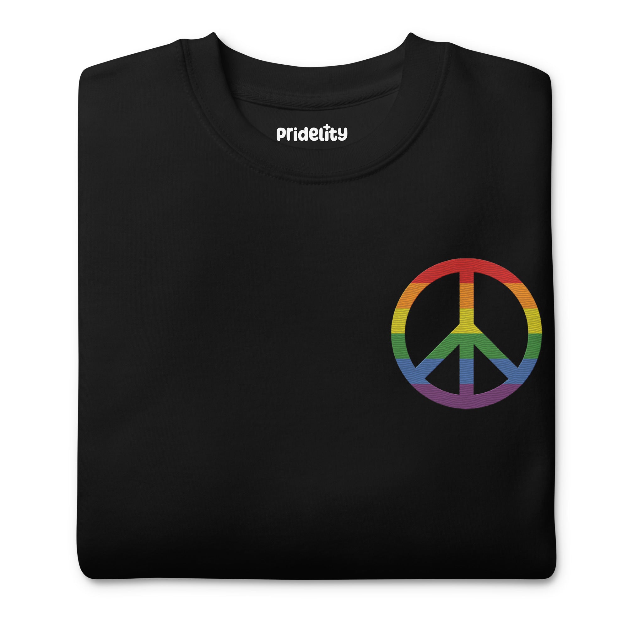 The Pridelity Peace Sweatshirt, a black piece from our pride collection, showcases a small, multicolored peace symbol on the upper left side. The rainbow colors embody diversity and peace. This essential pride garment is displayed flat against a white background.