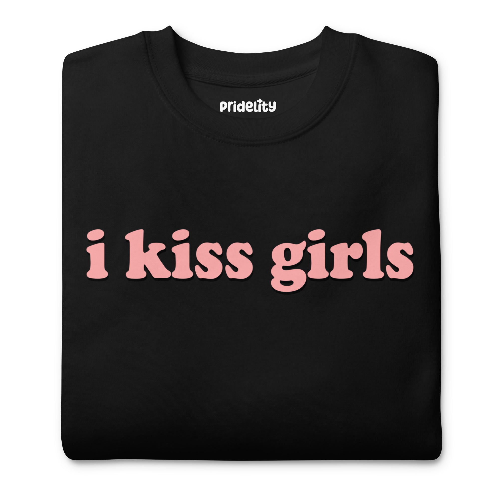 The Pridelity I Kiss Girls Sweatshirt is black and showcases the phrase 