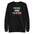 A "Here And Queer" sweatshirt by Pridelity, in a striking Team Royal shade, features a bold print and vibrant rainbow gradient design that elegantly represents LGBTQ+ pride.