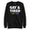 The "Gay & Tired Sweatshirt" by Pridelity is a black sweatshirt that displays bold white text saying "GAY & TIRED" along with colorful, rainbow-hued text below that reads "send help.