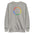 The Pridelity Pride Circle Sweatshirt displays a circular pattern with the word "pride" in eye-catching rainbow colors, making it an ideal addition to any pride ensemble. Available in white.