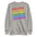 Introducing the Pridelity Loud & Proud Sweatshirt, a white garment adorned with "Loud & Proud" repeated five times in a striking rainbow gradient of red, orange, yellow, green, and blue—ideal for enthusiasts of bold and colorful fashion.