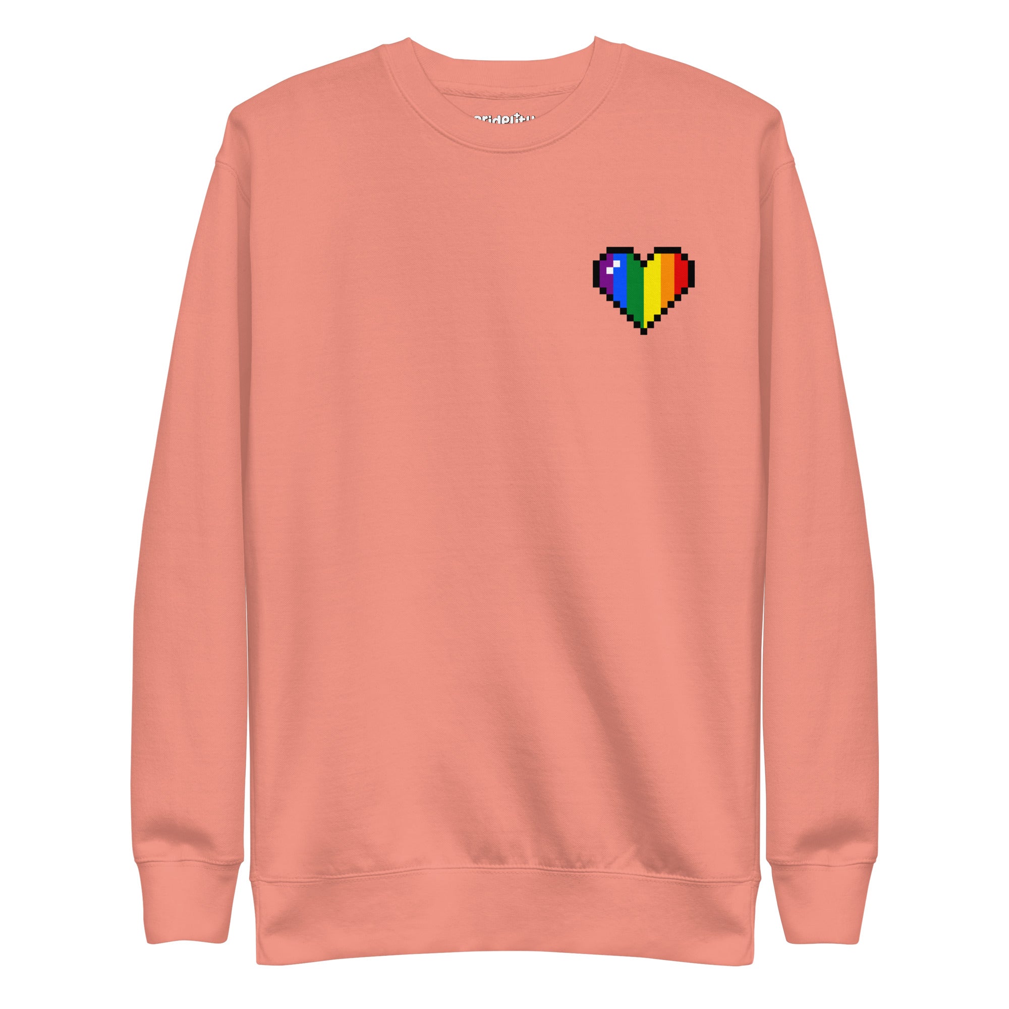 Check out the Pixel Heart Sweatshirt by Pridelity, a standout piece from our pride collection, decorated with a pixelated heart in bold rainbow hues on the left chest.