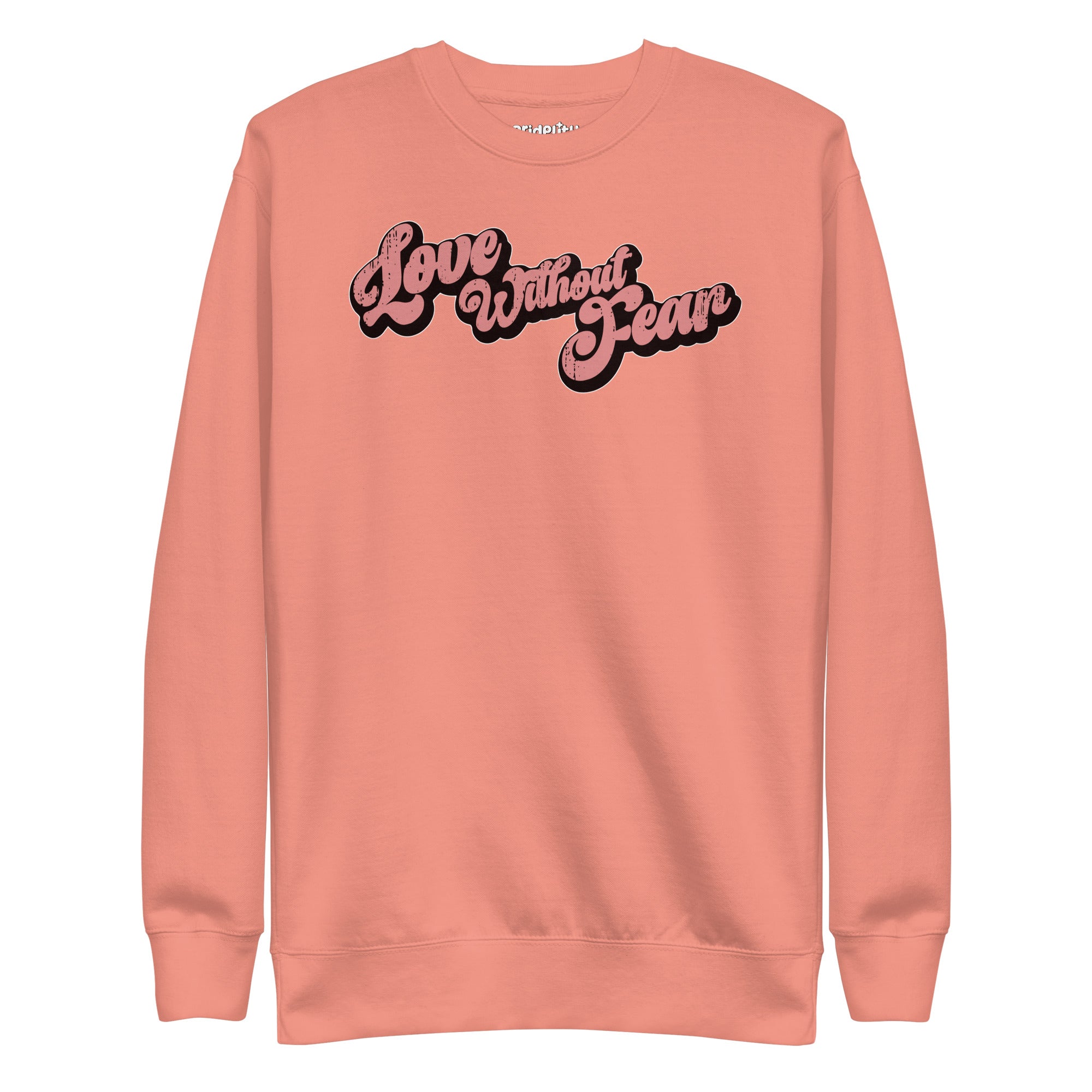 The Love Without Fear Sweatshirt from Pridelity, in a dusty rose color, features bold, retro-style black lettering across the chest that embraces the essence of rainbow clothes by celebrating love and diversity.