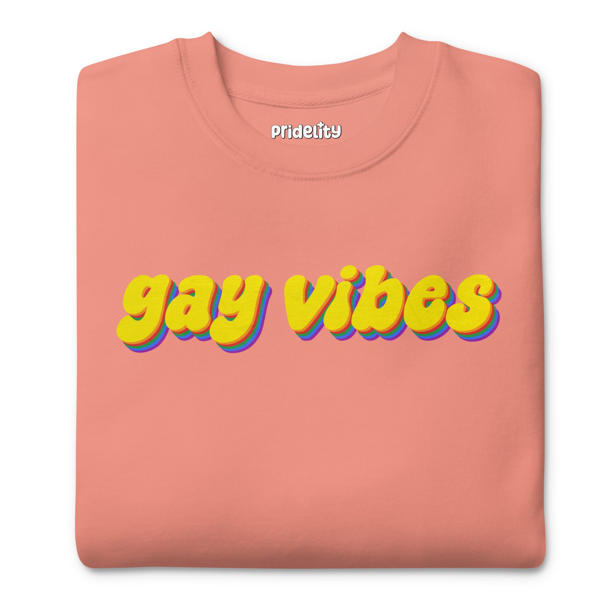 A dusty rose sweatshirt from Pridelity captures the essence of rainbow clothes style with the bold phrase 