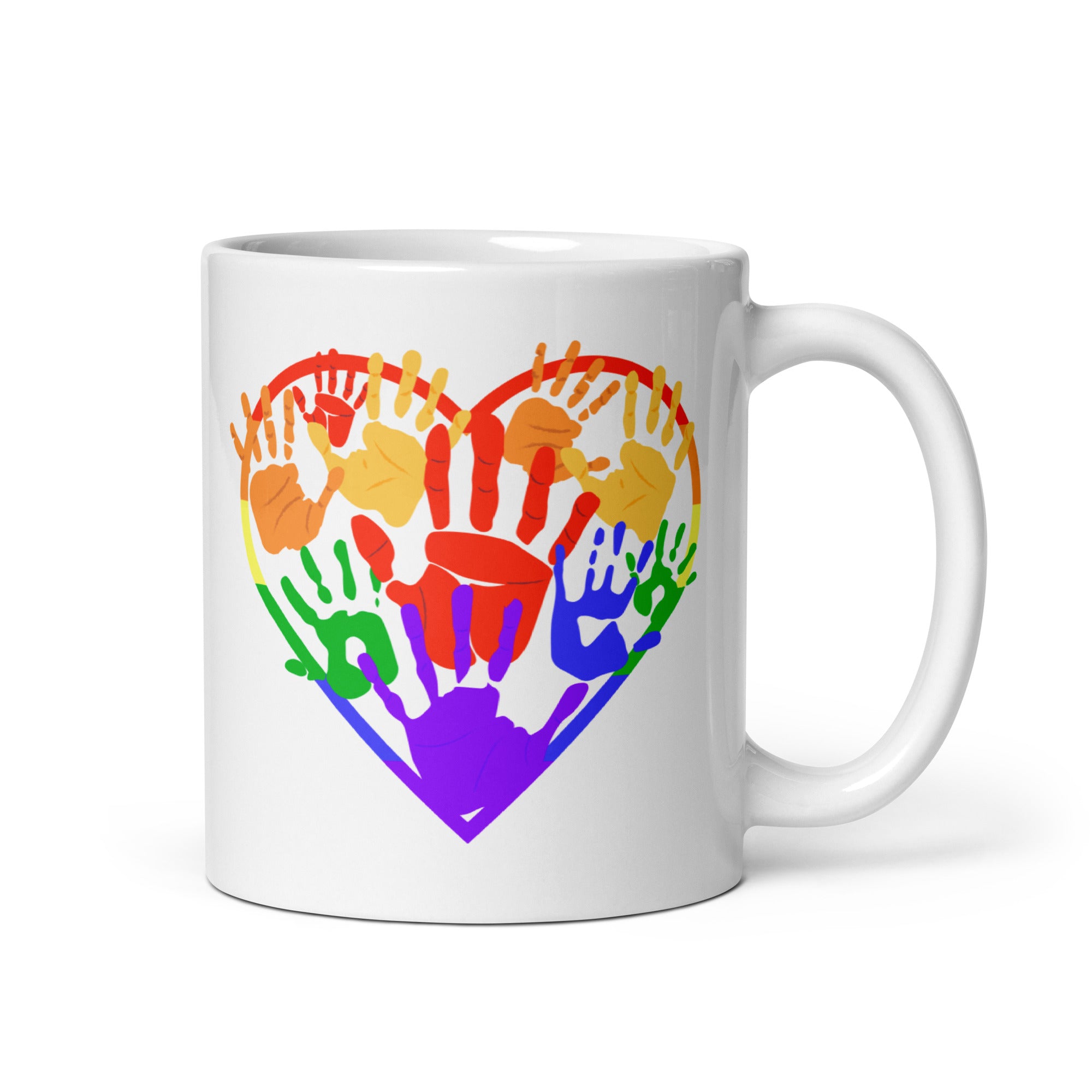 The Heart Hands Mug by Pridelity, part of the Best Pride Collections 2025, features a heart crafted from vibrant rainbow handprints, representing diversity and inclusion.