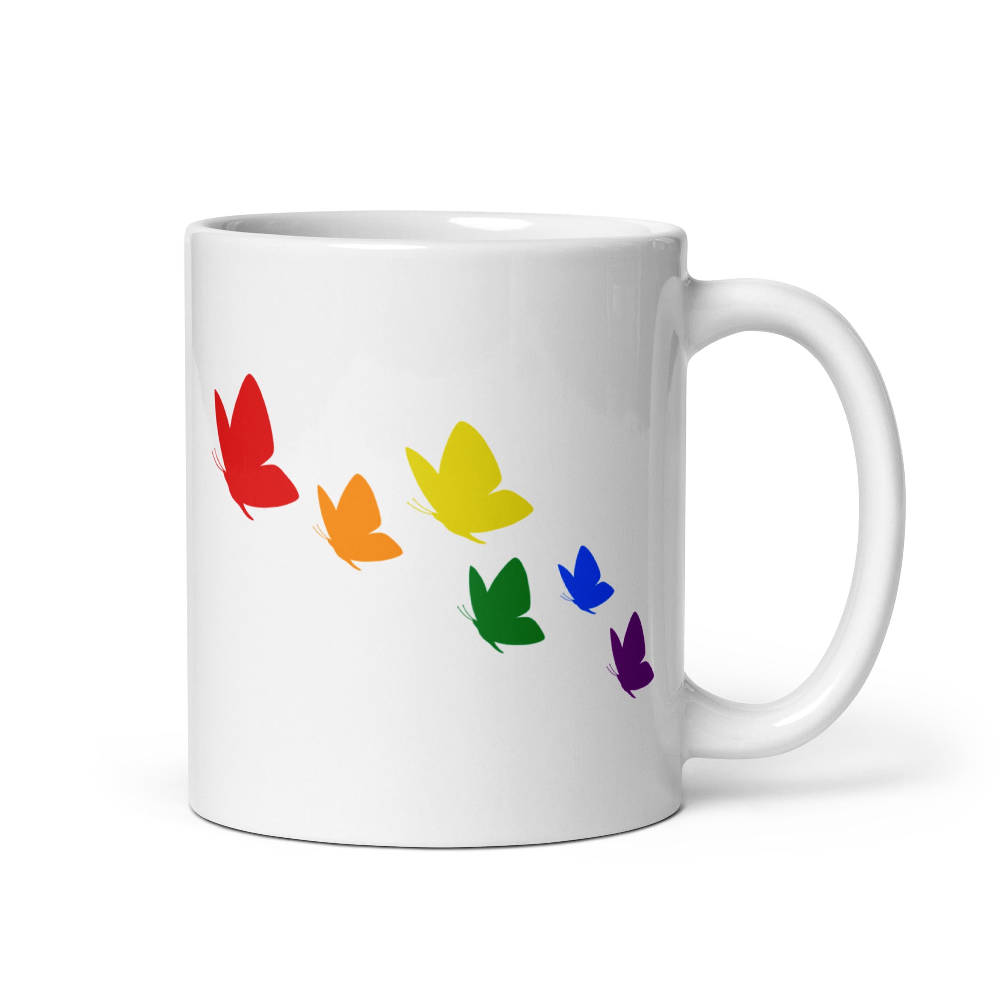 Introducing the Butterflies Mug by Pridelity: A white mug adorned with six vibrant butterflies in a diagonal arrangement. These butterflies showcase a stunning gradient from red to purple, reflecting the colors of the rainbow, making it an ideal addition to your Pride Collection.