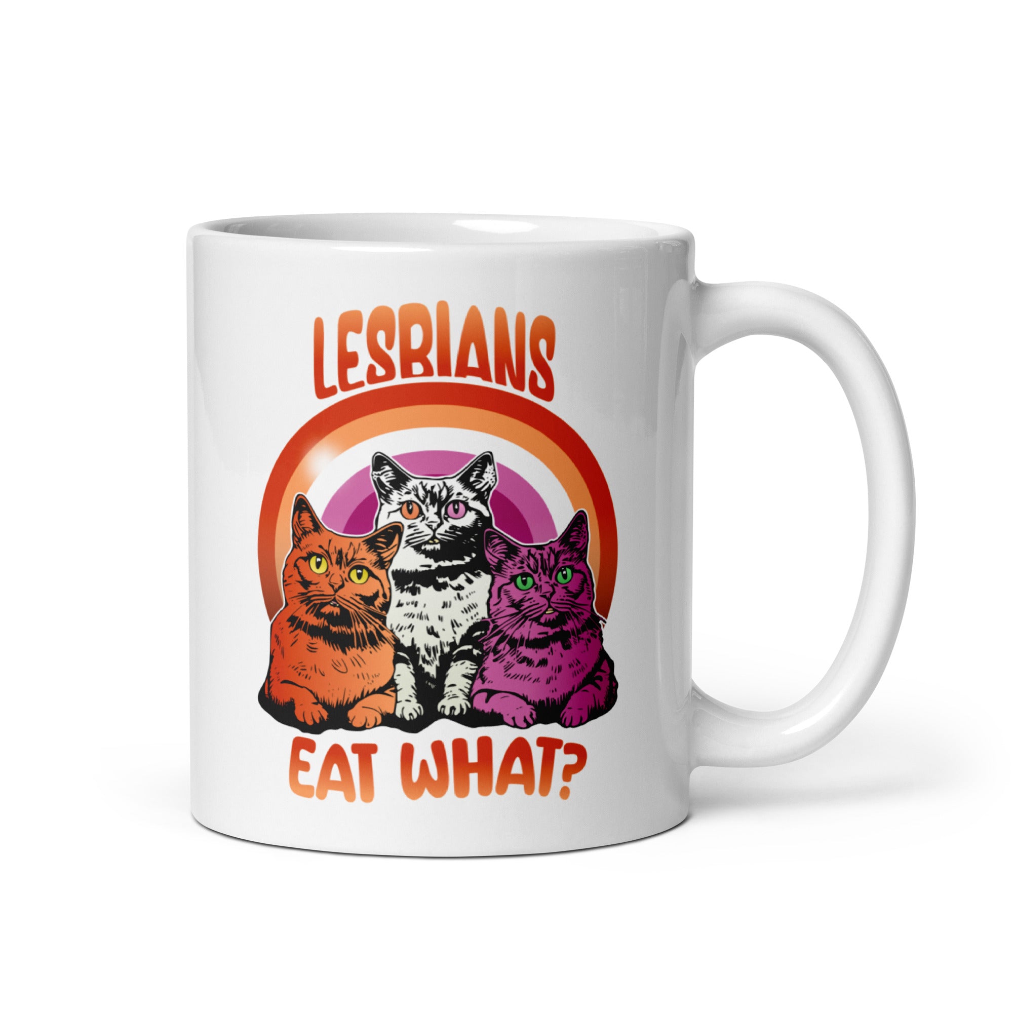 As part of Pridelity's finest Pride Collections 2025, the Lesbians Eat What Mug features a vibrant design with three colorful cats. The playful artwork is complemented by bold, retro-style orange text reading 