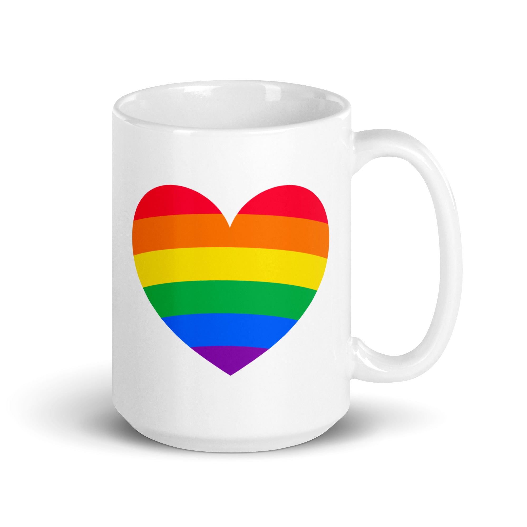 The Pride Heart Mug by Pridelity is a white mug from the Pride Collections 2025, adorned with a rainbow heart design on its side. The heart displays horizontal stripes in red, orange, yellow, green, blue, and purple to celebrate the colors of the LGBTQ+ pride flag.