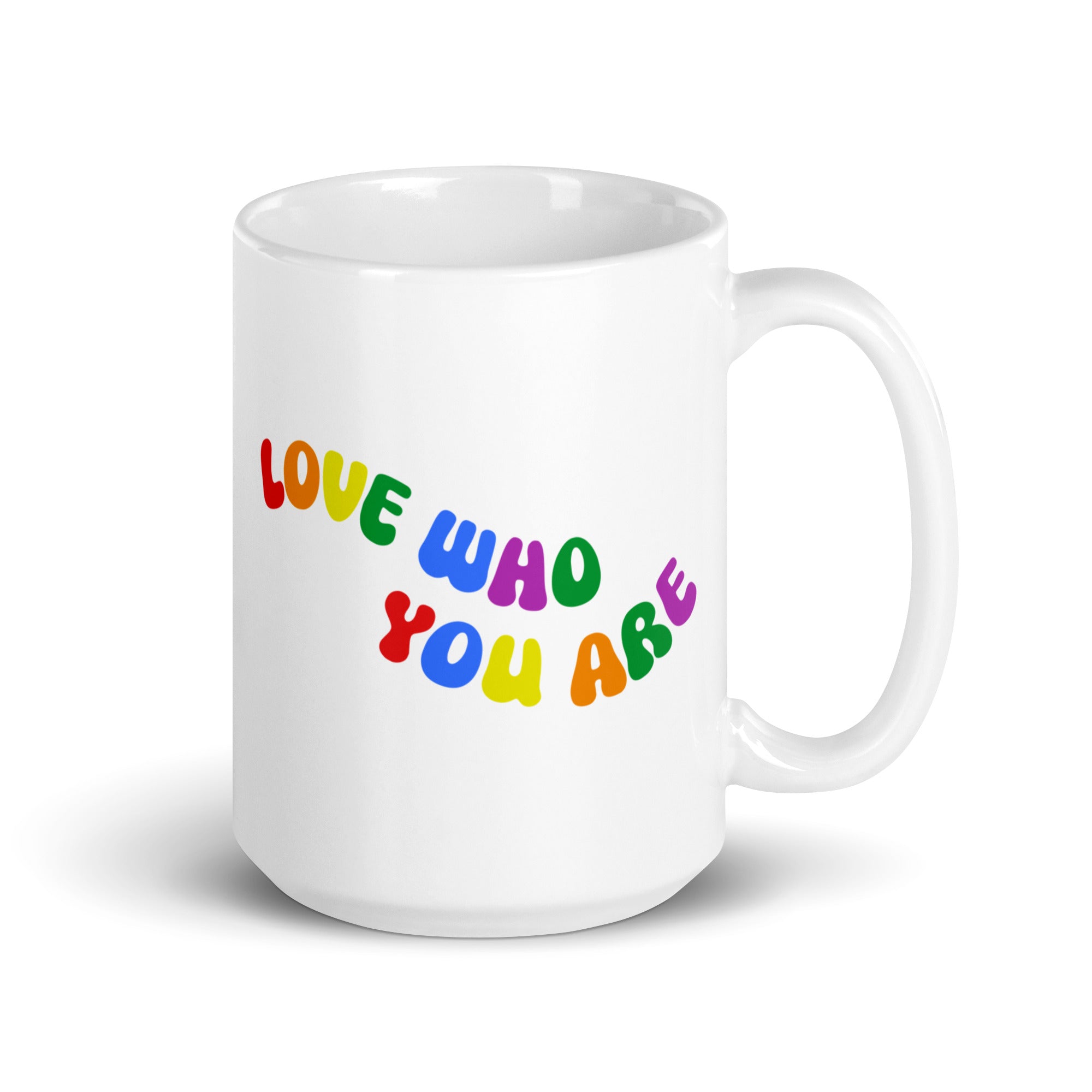 The Love Who You Are Mug by Pridelity is a white mug featuring vibrant letters spelling 